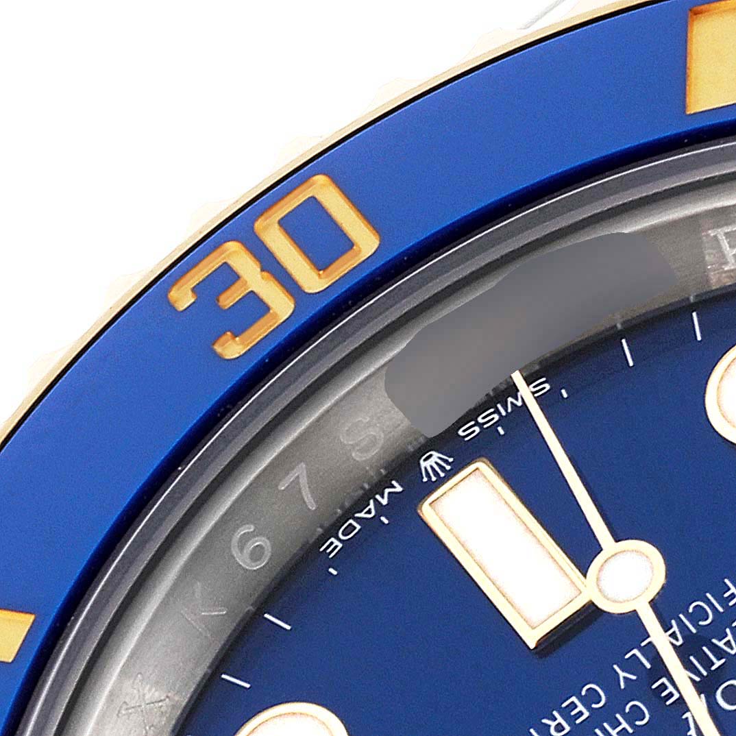 The image shows a close-up of the Rolex Submariner 126613 Men's Steel and Gold (two tone) Blue Dial 126613 Men's Steel and Gold (two tone) Blue Dial watch dial and bezel, highlighting the "30" marker and part of the "Swiss Made" text.