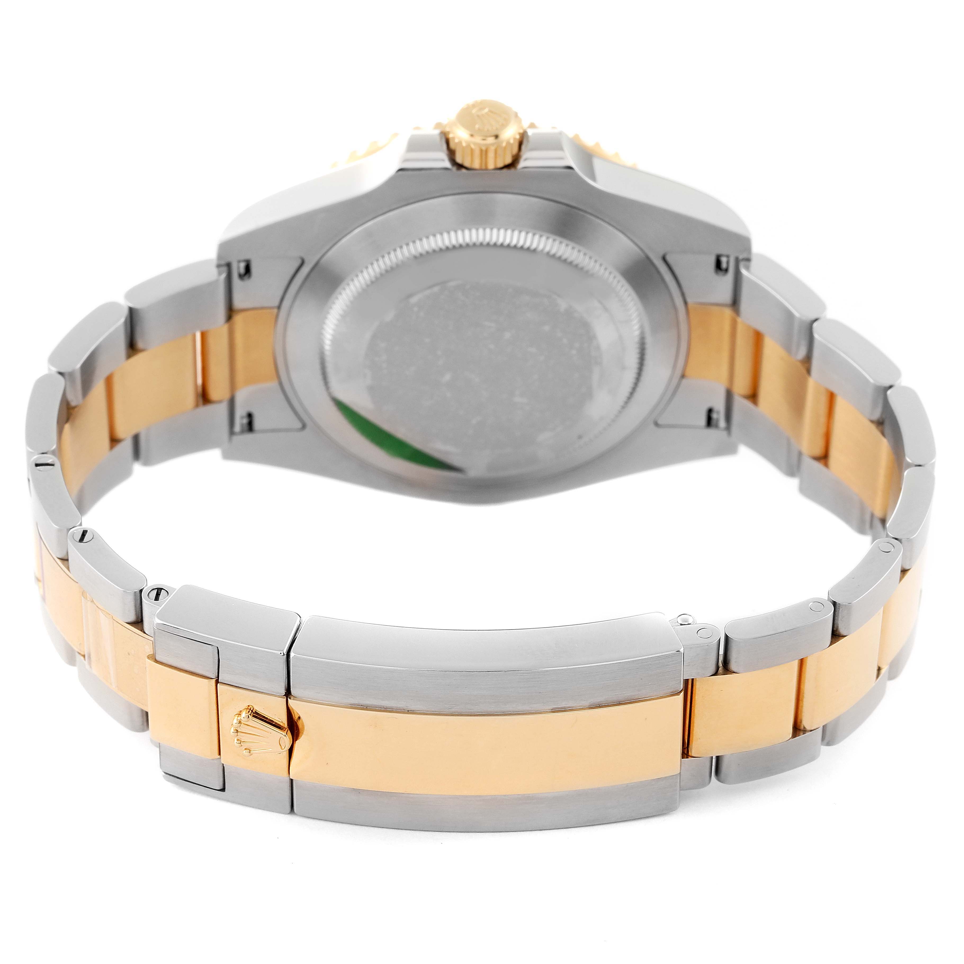 This image shows the back view of a Rolex Submariner 126613 Men's Steel and Gold (two tone) Blue Dial 126613 Men's Steel and Gold (two tone) Blue Dial watch, highlighting its two-tone bracelet and case back.