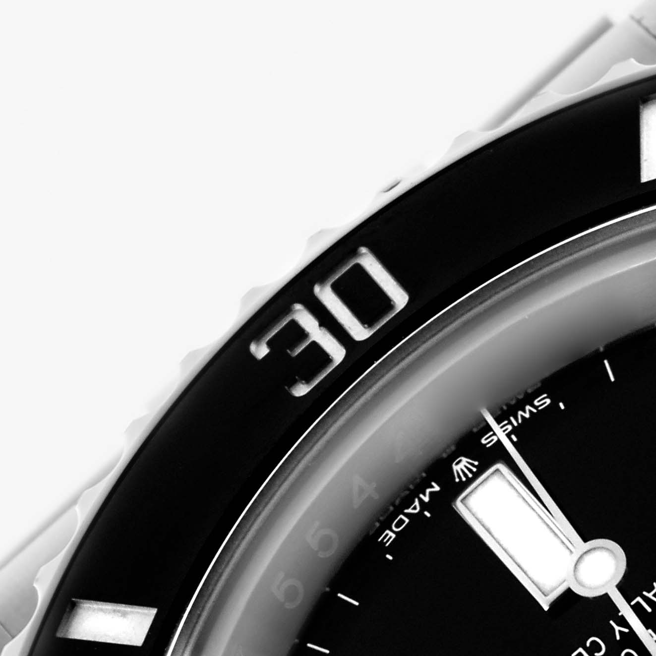 The image shows a close-up of the Rolex Submariner 126610LN Men's Stainless Steel Black Dial 126610LN Men's Stainless Steel Black Dial's bezel and dial, highlighting the "30" marker on the bezel.