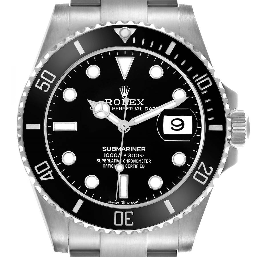 The Rolex Submariner watch is shown from the front, displaying the dial, bezel, and part of the bracelet.