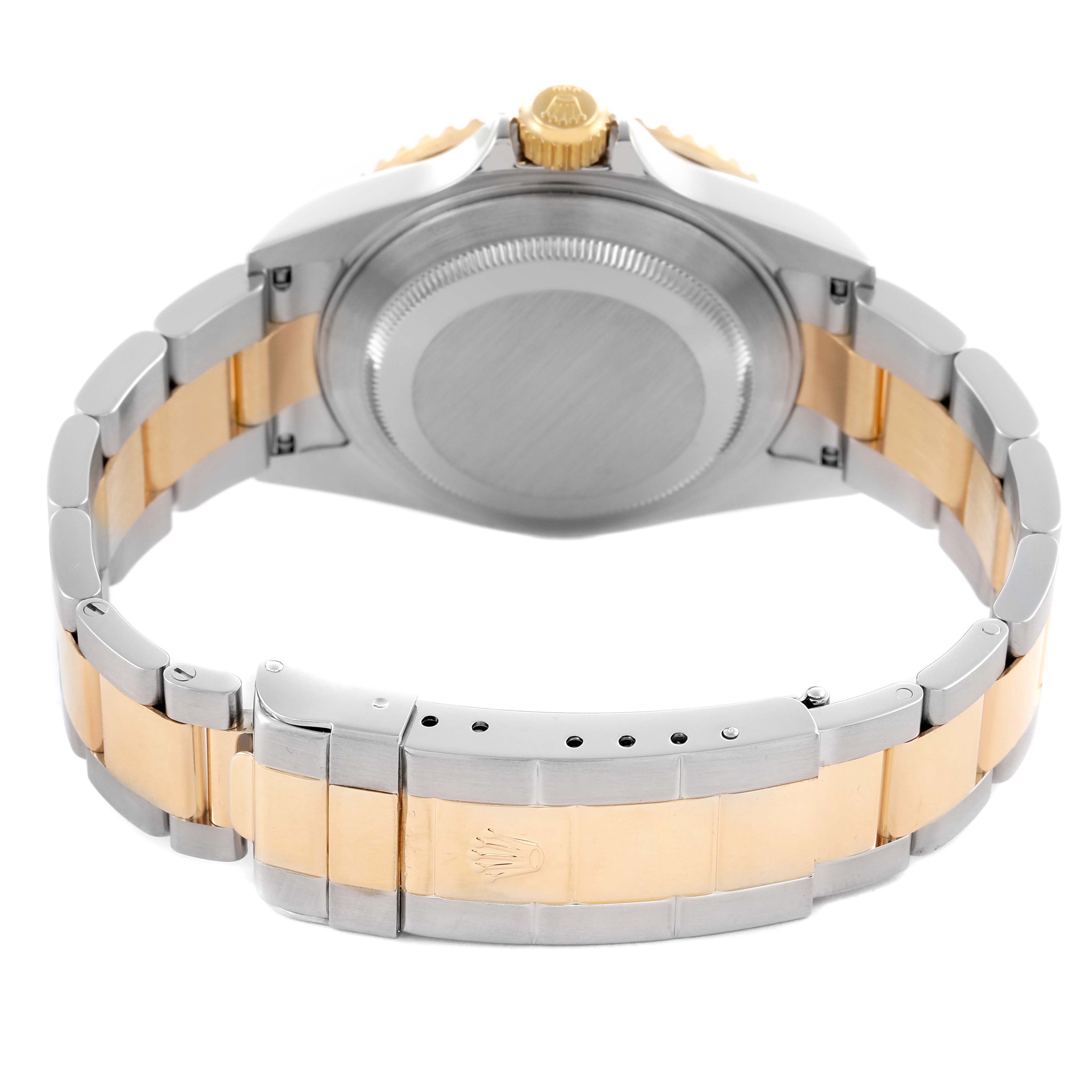 The image shows the back of a Rolex Submariner 16613 Men's Steel and Gold (two tone) Blue Dial 16613 Men's Steel and Gold (two tone) Blue Dial watch, highlighting its case back, crown, and two-tone bracelet with clasp.