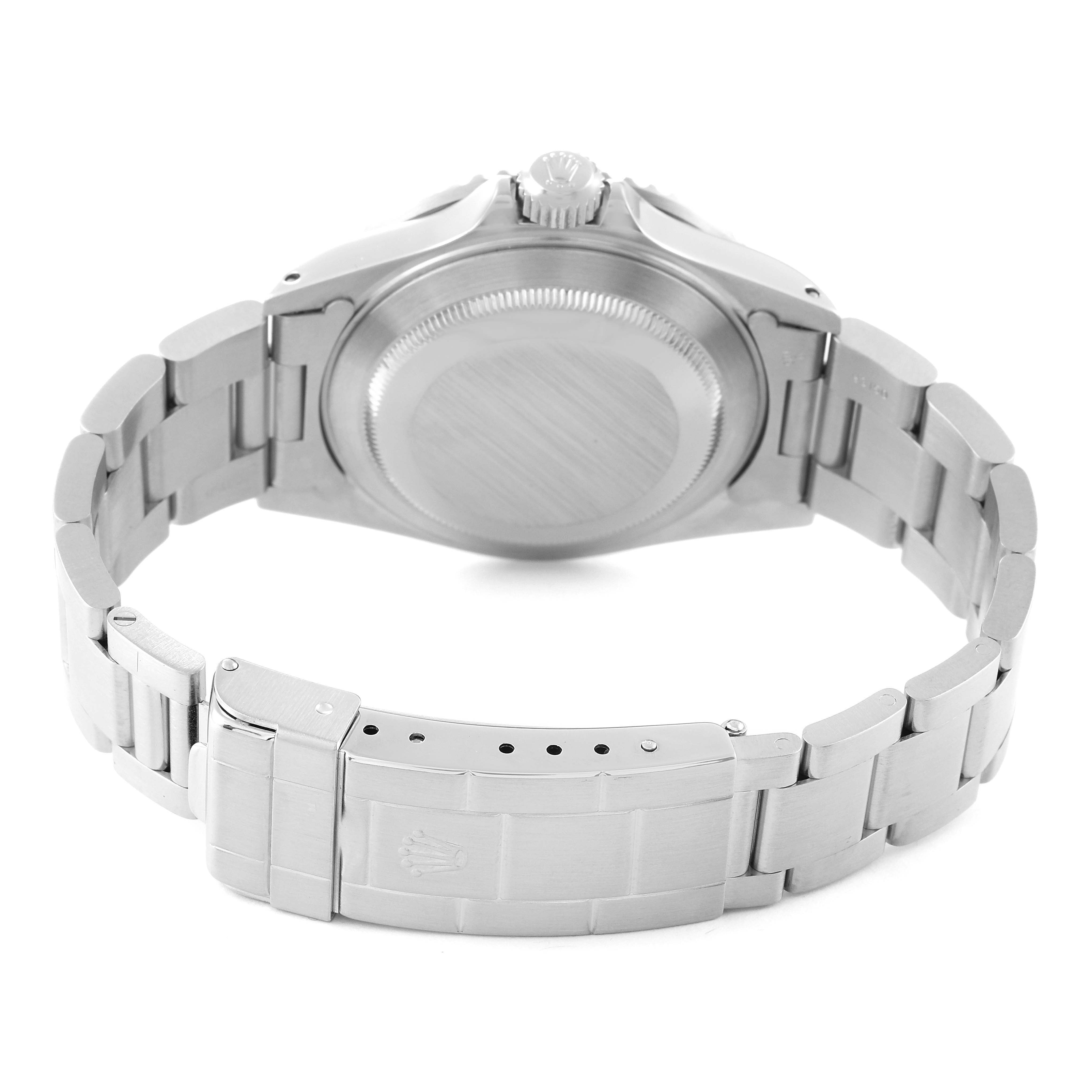 This image shows the back and the bracelet clasp of a Rolex Submariner 16610 Men's Stainless Steel Black Dial 16610 Men's Stainless Steel Black Dial watch from a rear angle.