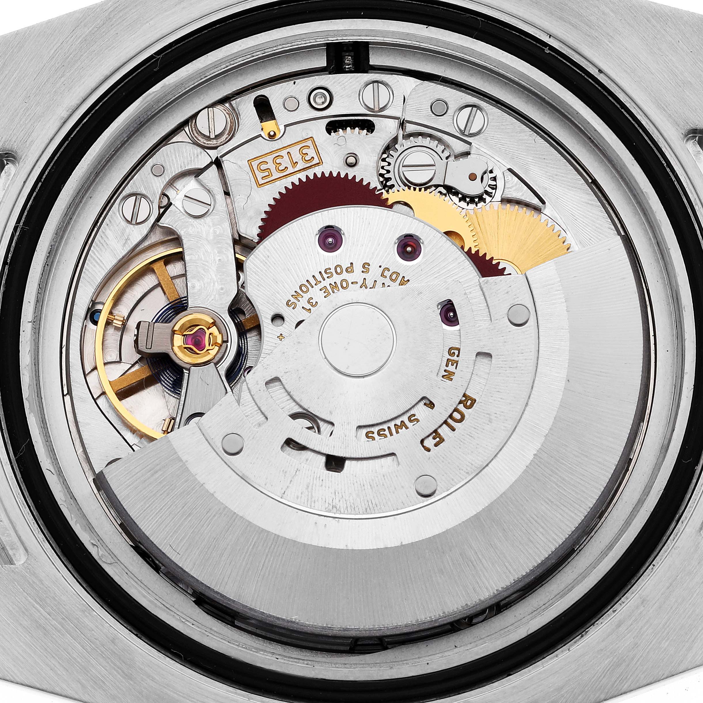 This image shows the internal mechanical movement of a Rolex Submariner 116613 Men
s Steel and Gold (two tone) Blue Dial 116613 Men
s Steel and Gold (two tone) Blue Dial watch from a top-down angle.