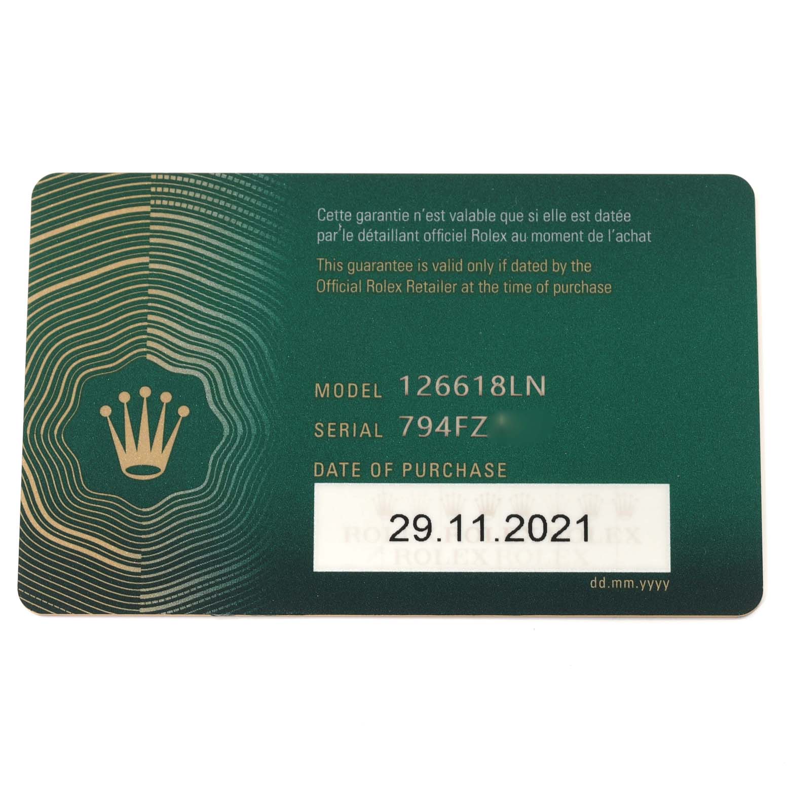 This is a warranty card for the Rolex Submariner 126618 Men's Yellow Gold Black Dial 126618 Men's Yellow Gold Black Dial model 126618LN, featuring the purchase date.