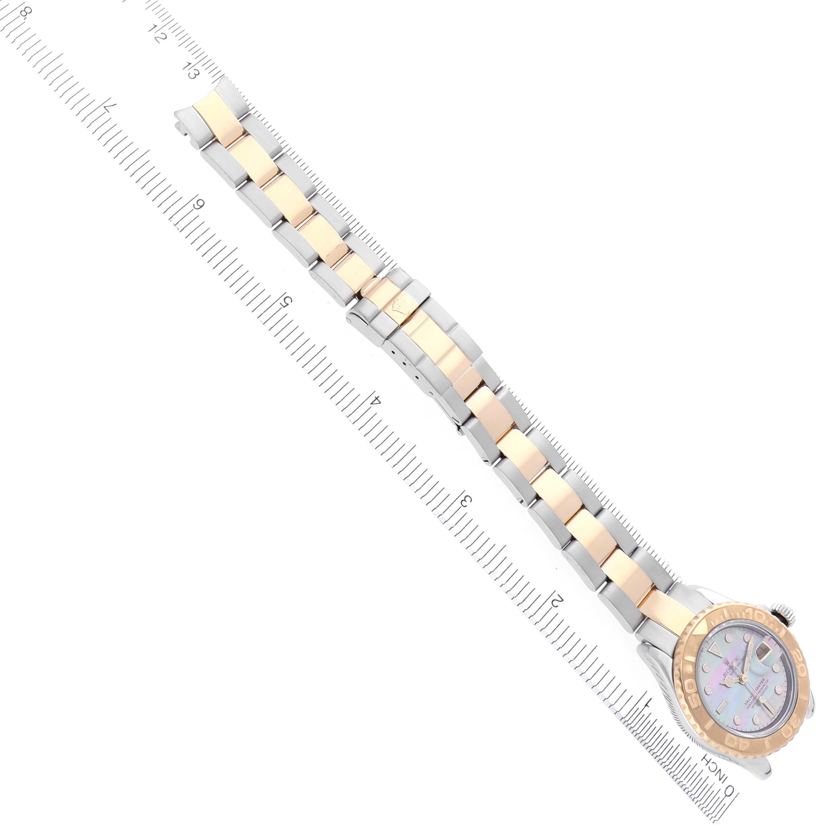 The Rolex Yacht-Master 169623 Women
s Steel and Gold (two tone) Mother of Pearl Dial 169623 Women
s Steel and Gold (two tone) Mother of Pearl Dial watch is shown from a top-down angle, displaying its full bracelet, clasp, and dial.