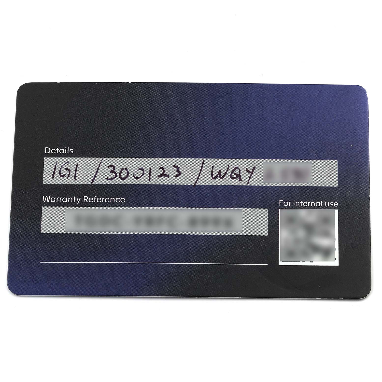 This image shows the warranty card for a Tag Heuer Aquaracer WBP2010.BA0632 Men's Stainless Steel Blue Dial WBP2010.BA0632 Men's Stainless Steel Blue Dial watch from a top-down angle.