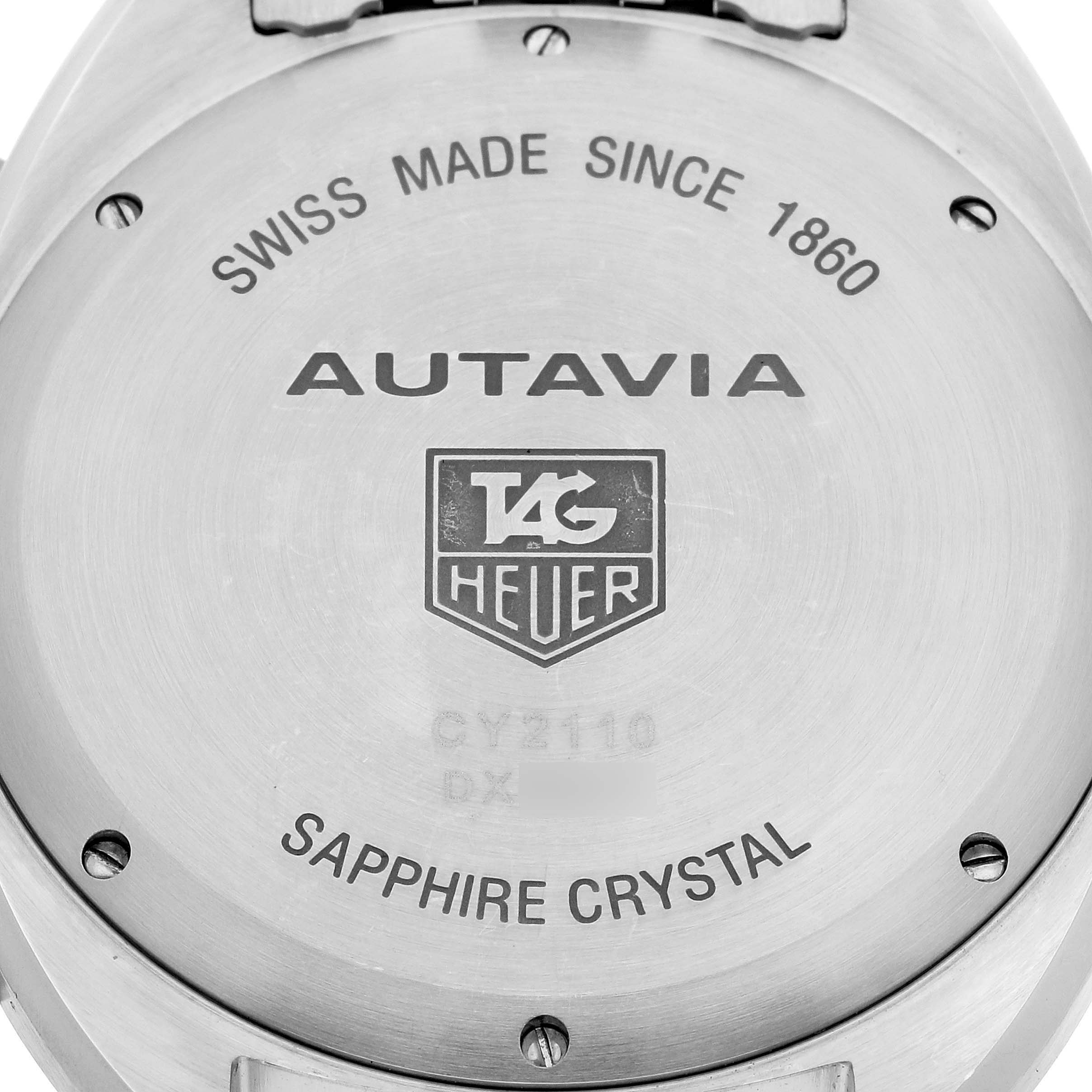 This image shows the back case of a Tag Heuer Autavia CY2110.BA0775 Men's Stainless Steel Silver Dial CY2110.BA0775 Men's Stainless Steel Silver Dial watch with engraved details.