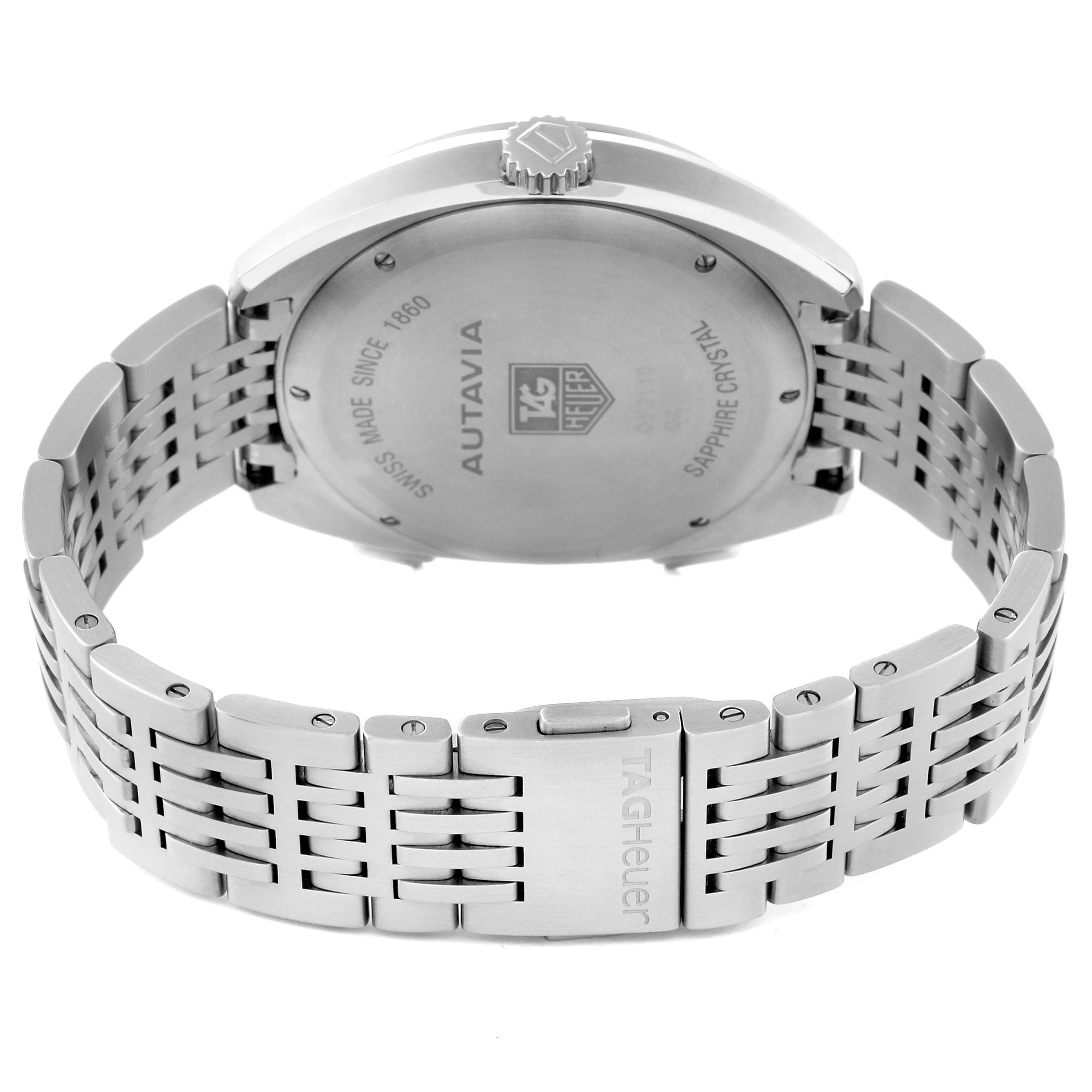 The image shows the back case and bracelet of a Tag Heuer Autavia CY2110.BA0775 Men's Stainless Steel Silver Dial CY2110.BA0775 Men's Stainless Steel Silver Dial watch, highlighting the engraved back cover and clasp.
