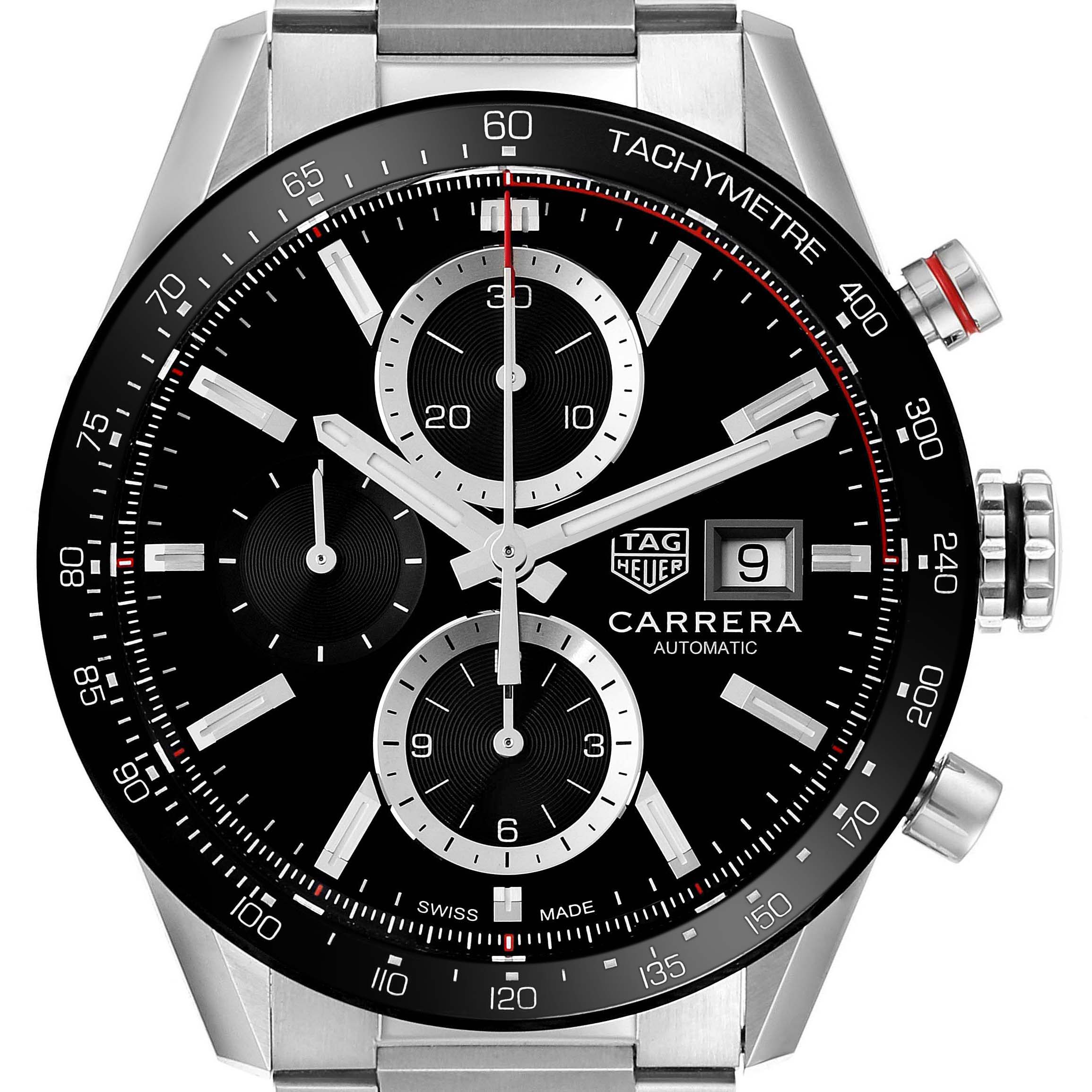 The image shows a frontal view of the Tag Heuer Carrera CBM2110 Men's Stainless Steel Black Dial CBM2110 Men's Stainless Steel Black Dial watch, highlighting its chronograph, tachymeter scale, date window, and logo.