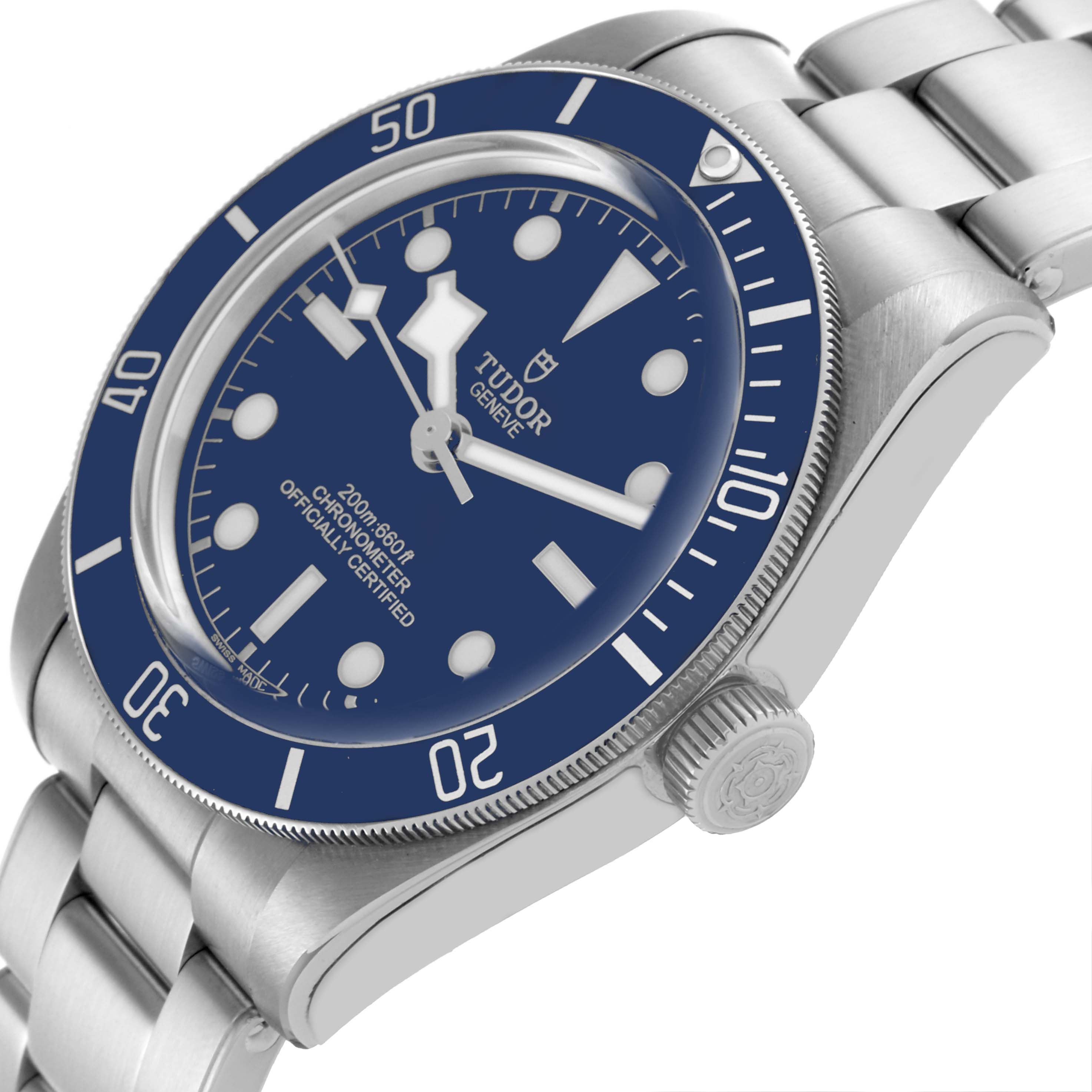 The Tudor Heritage Black Bay M79030B-0001 Men's Stainless Steel Blue Dial M79030B-0001 Men's Stainless Steel Blue Dial watch is shown at an angled side view, highlighting its blue bezel, dial, crown, and bracelet.