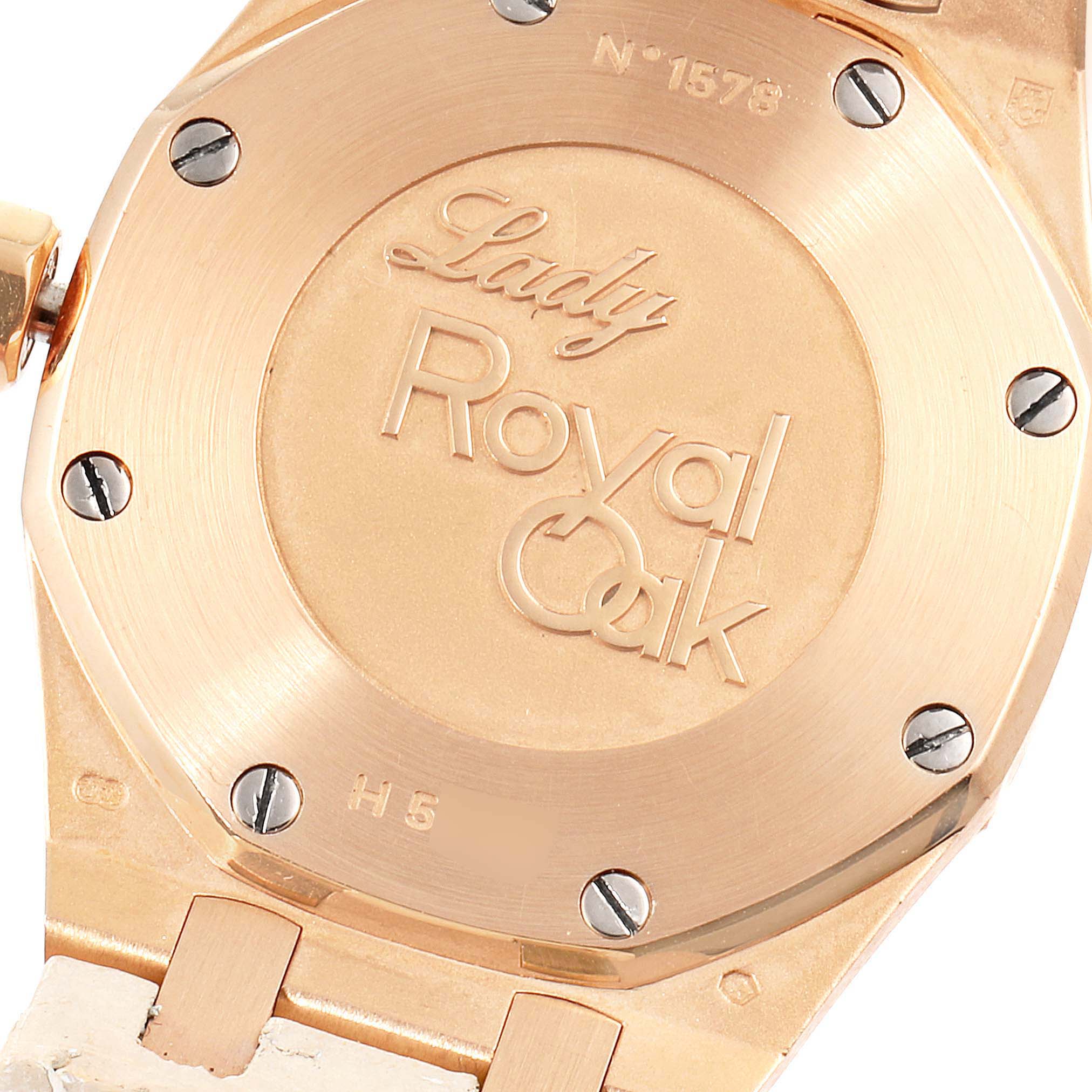 This image shows the case back of the Audemars Piguet Royal Oak 67621OR.ZZ.D010CA.01 Women's Rose Gold Silver Dial 67621OR.ZZ.D010CA.01 Women's Rose Gold Silver Dial Lady watch, displaying branding and serial/right numbers.