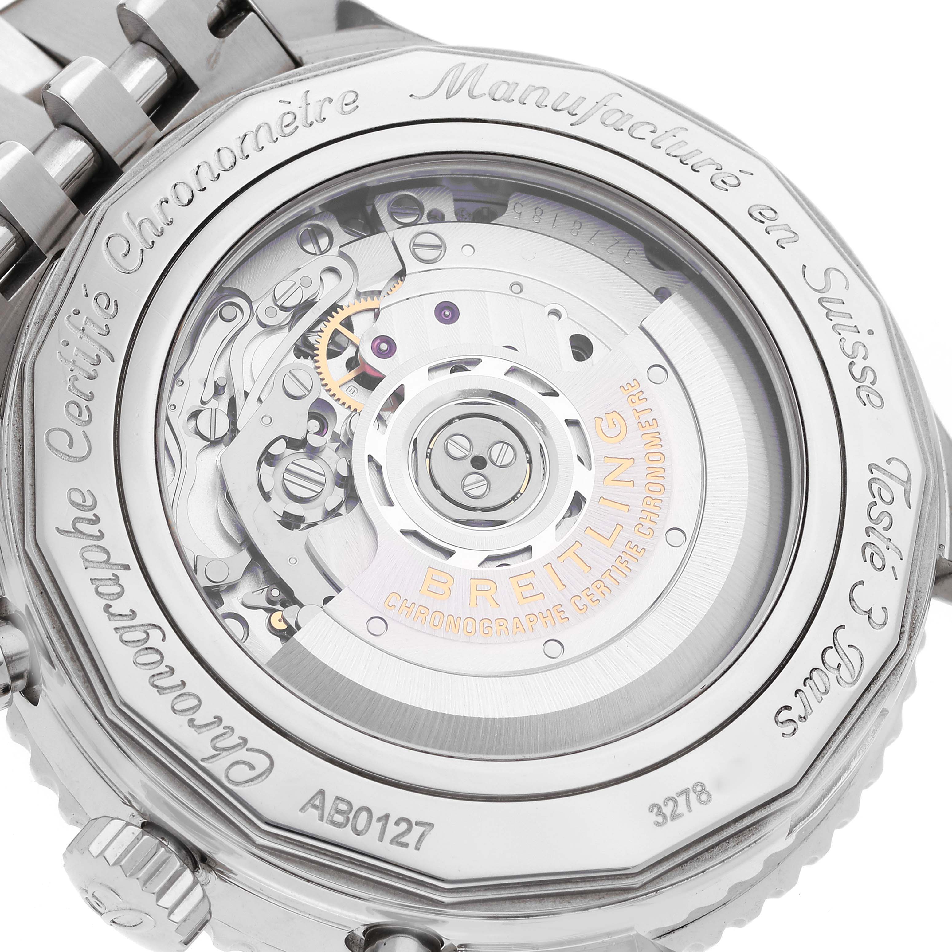 This image shows the back of a Breitling Navitimer AB0127 Men's Stainless Steel Blue Dial AB0127 Men's Stainless Steel Blue Dial watch, displaying its intricate movement and engraved details.