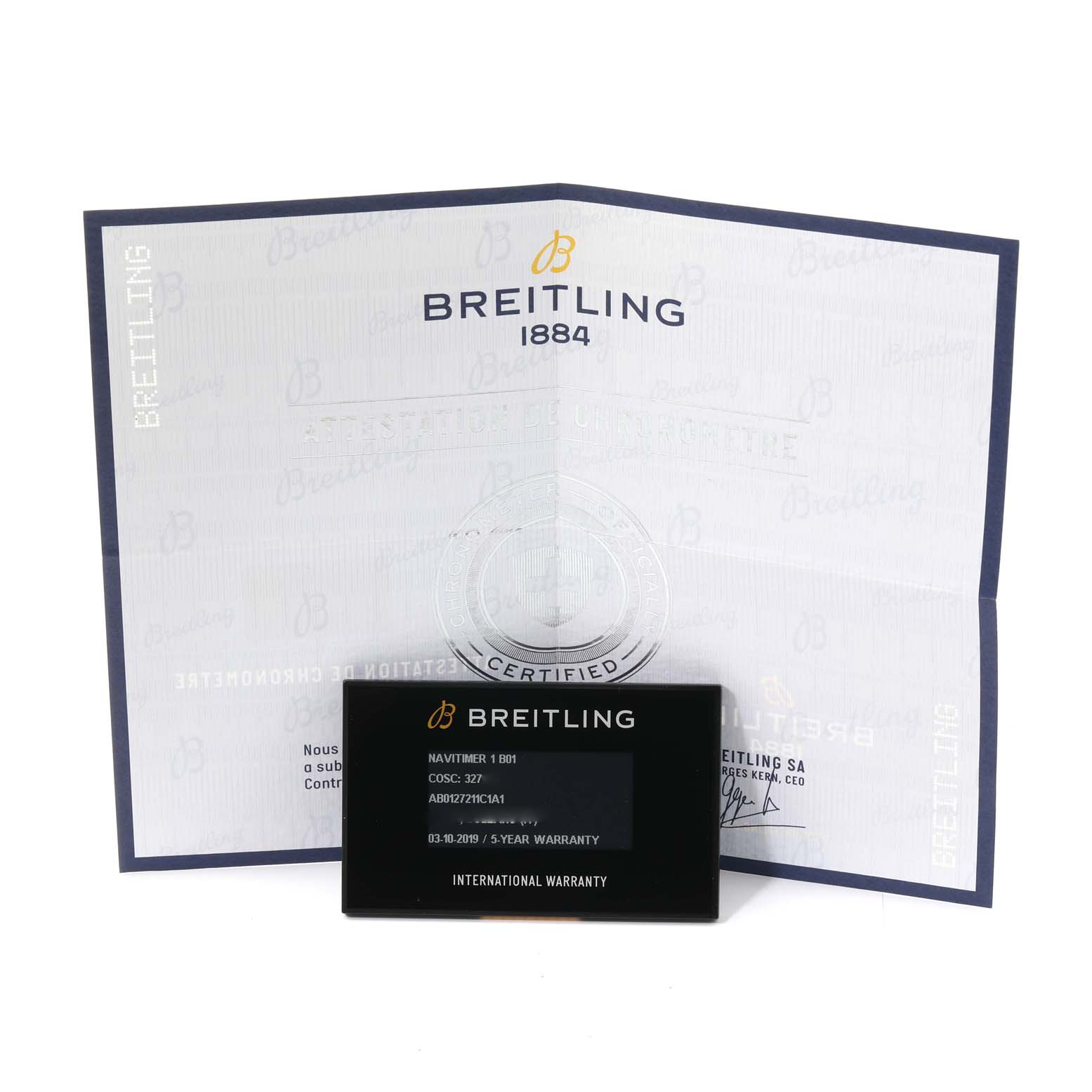 This image shows the warranty card and certificate for the Breitling Navitimer AB0127 Men's Stainless Steel Blue Dial AB0127 Men's Stainless Steel Blue Dial watch model.