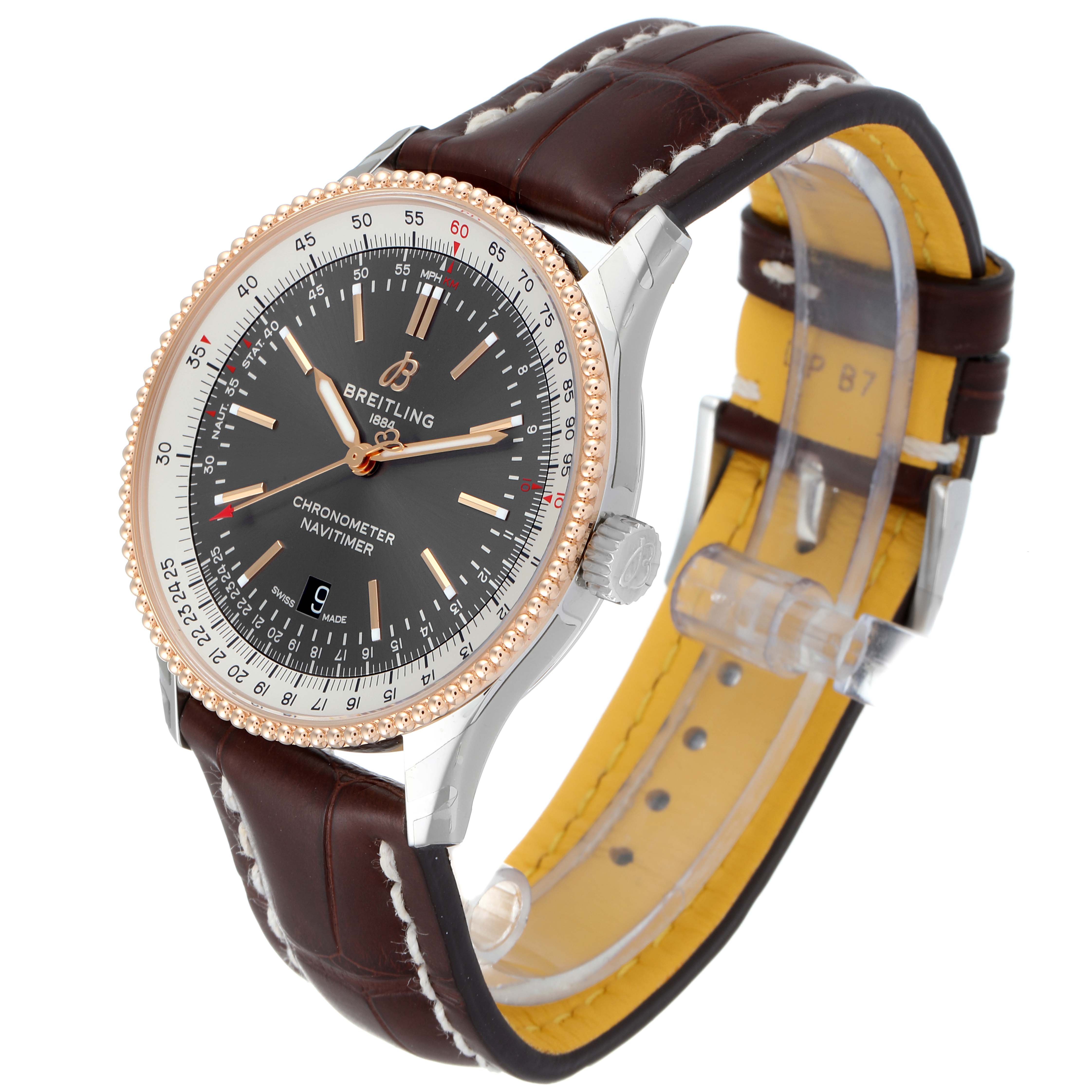 The Breitling Navitimer U17326 Men's Steel and Gold (two tone) Grey Dial U17326 Men's Steel and Gold (two tone) Grey Dial watch is shown at a three-quarter angle, displaying the face, bezel, crown, and leather strap.