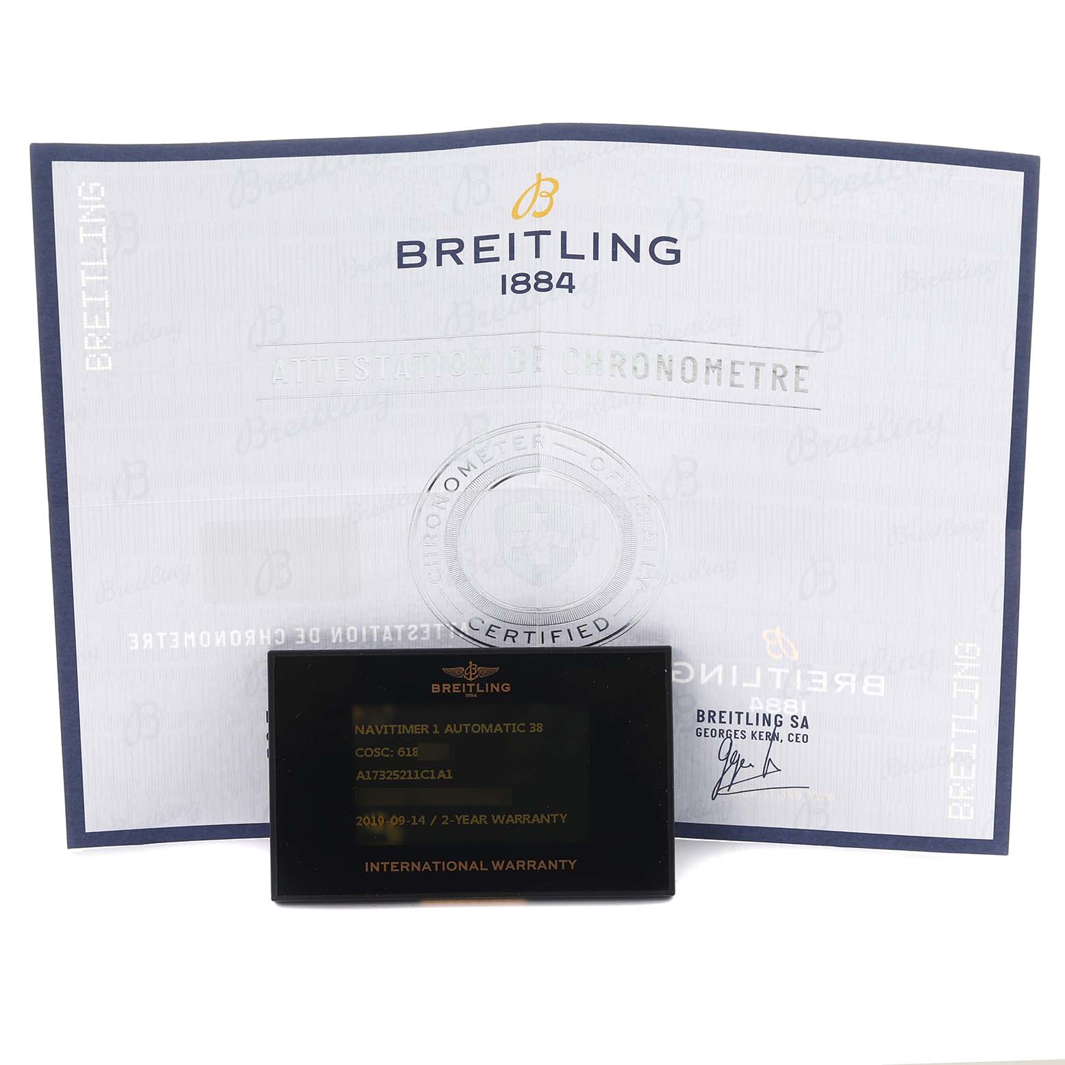 The image shows a Breitling Navitimer A17325211C1A1 Men's Stainless Steel Blue Dial A17325211C1A1 Men's Stainless Steel Blue Dial model's certificate and international warranty card from a front angle.
