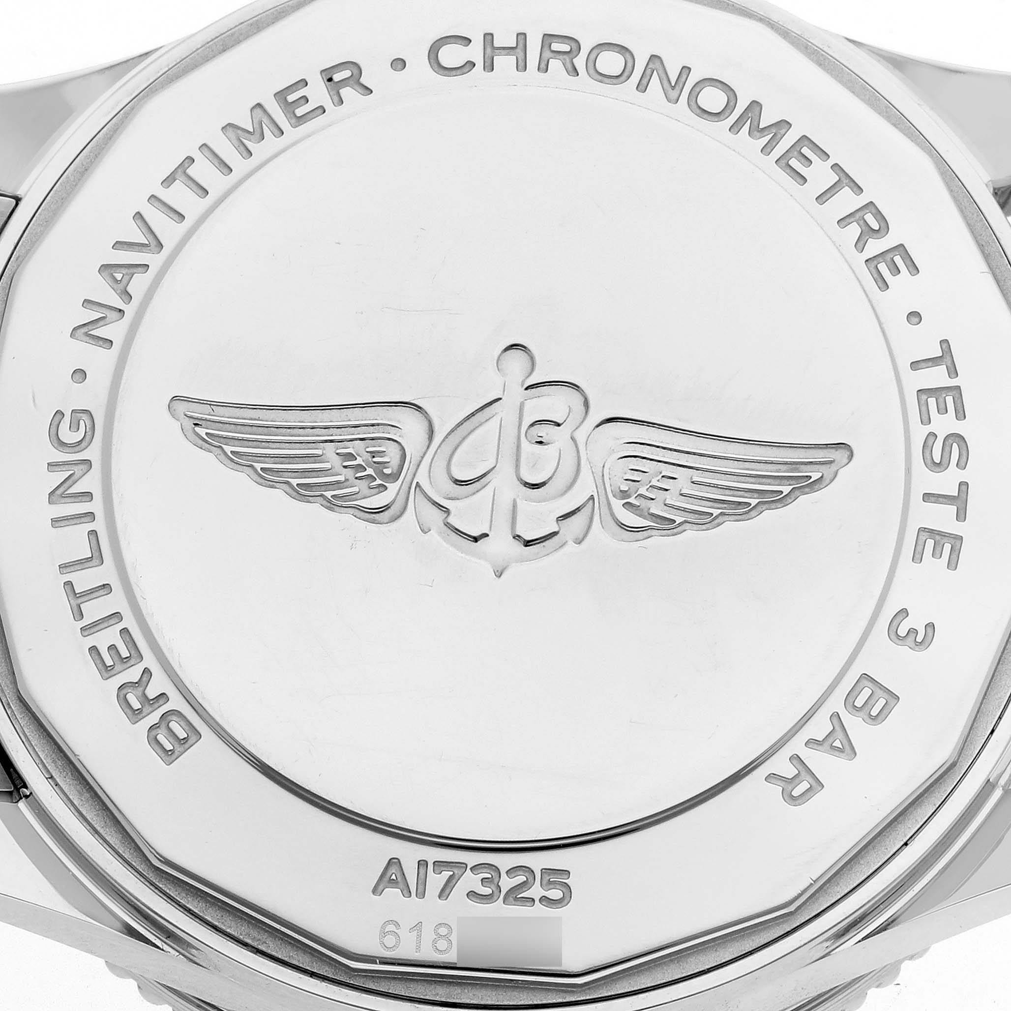 The image shows the back case of a Breitling Navitimer A17325211C1A1 Men's Stainless Steel Blue Dial A17325211C1A1 Men's Stainless Steel Blue Dial watch with logo engravings.