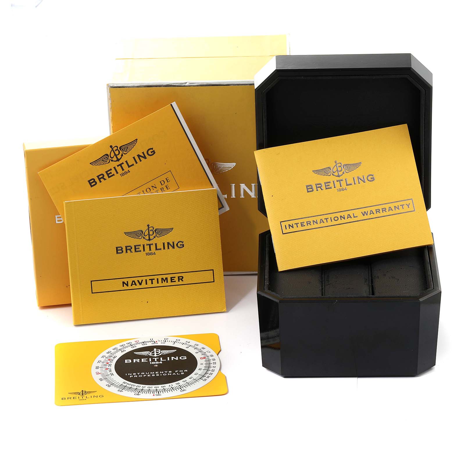 The image shows the packaging and accessories for a Breitling Navitimer A23322 Men
s Stainless Steel Black Dial A23322 Men
s Stainless Steel Black Dial watch, including warranty cards and manuals.