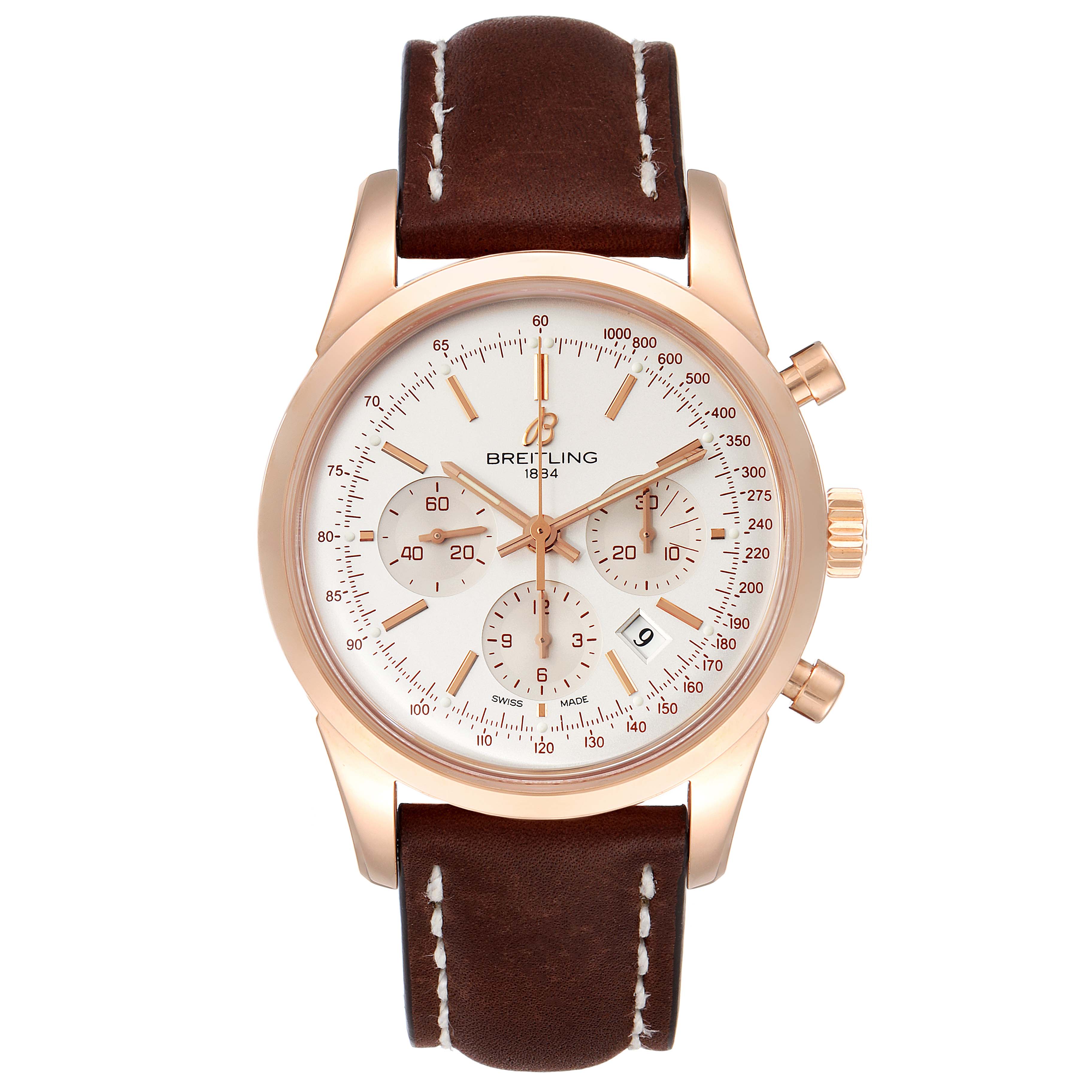 This image shows a front view of the Breitling Transocean RB0152 Men's Rose Gold Silver Dial RB0152 Men's Rose Gold Silver Dial watch, displaying its dial, chronograph sub-dials, and leather strap.