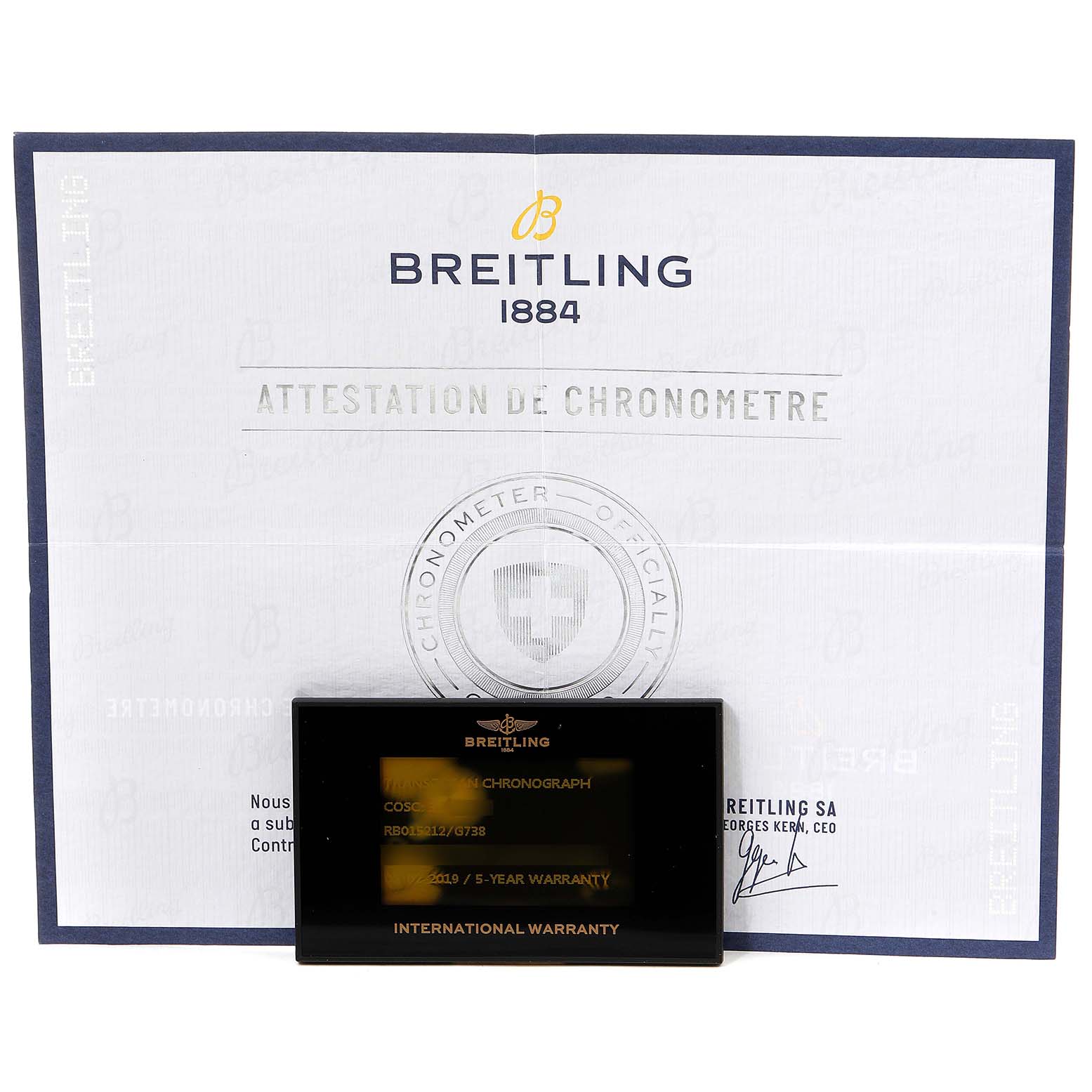 The image shows the Breitling Transocean RB0152 Men's Rose Gold Silver Dial RB0152 Men's Rose Gold Silver Dial model's attestation de chronomètre certificate and international warranty card.