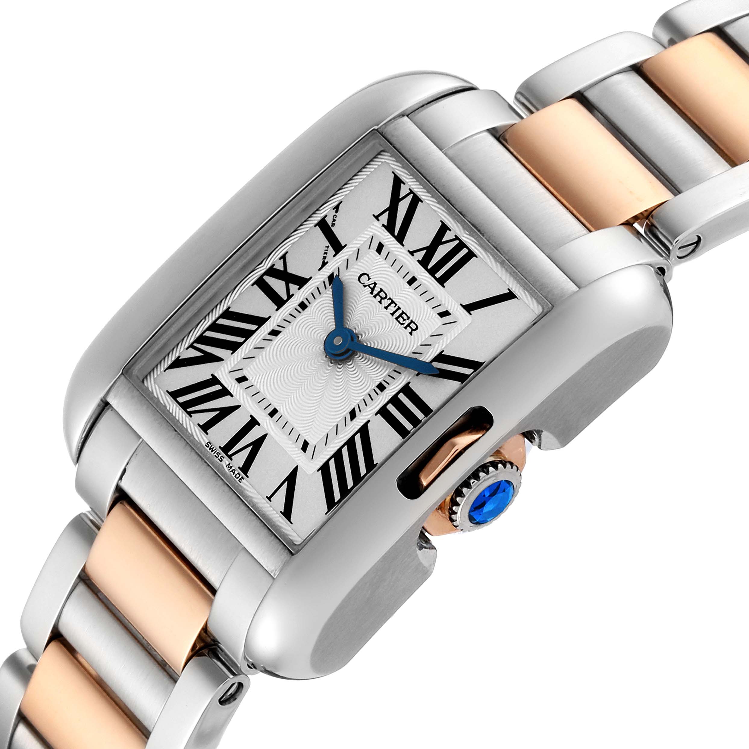 This image shows a close-up of the Cartier Tank Anglaise W5310036 Women's Steel and Gold (two tone) Silver Dial W5310036 Women's Steel and Gold (two tone) Silver Dial watch, focusing on its face, crown, and two-tone bracelet.