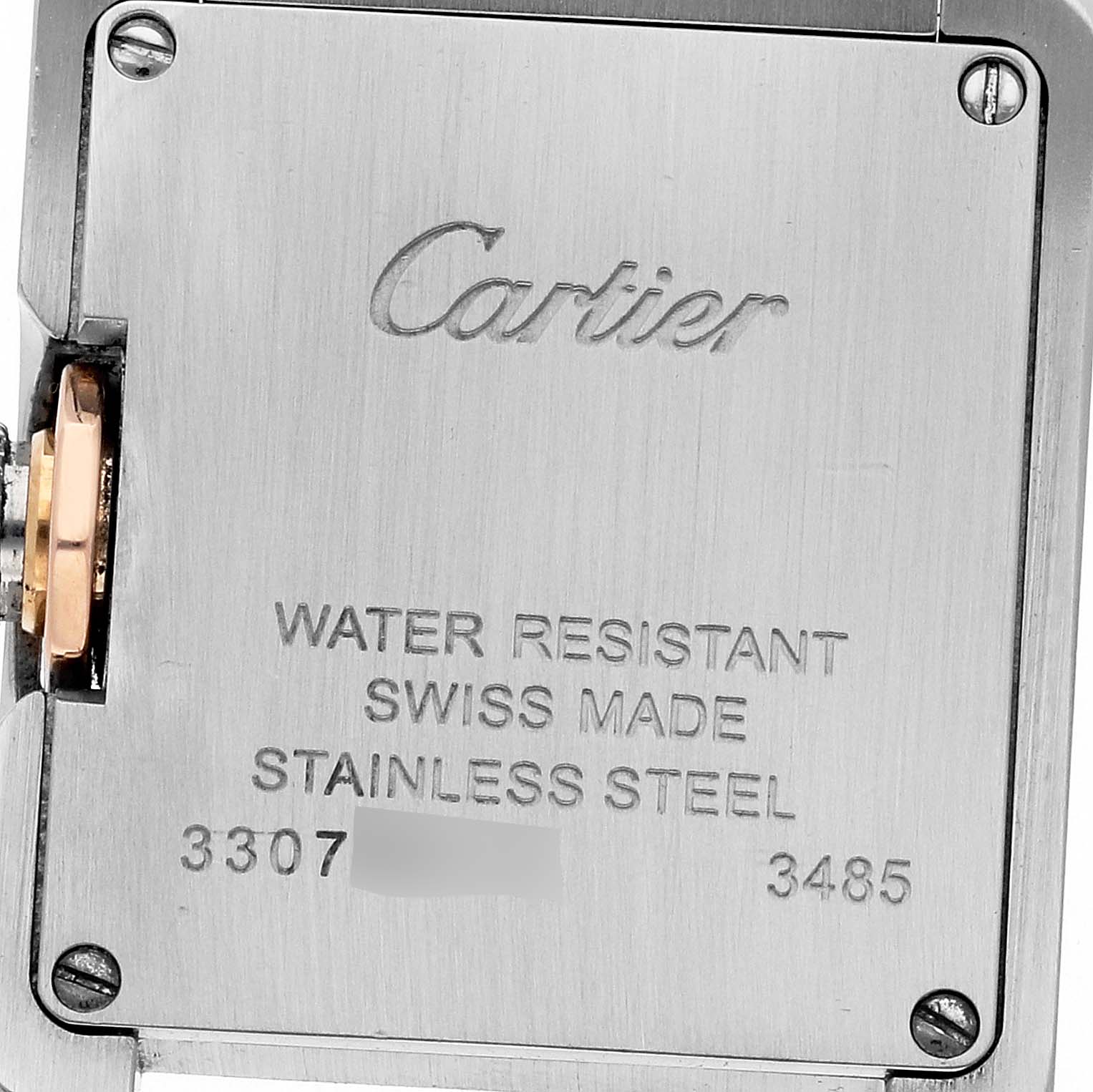 The image shows the back case of a Cartier Tank Anglaise W5310036 Women's Steel and Gold (two tone) Silver Dial W5310036 Women's Steel and Gold (two tone) Silver Dial watch, displaying text about water resistance, material, and origin.