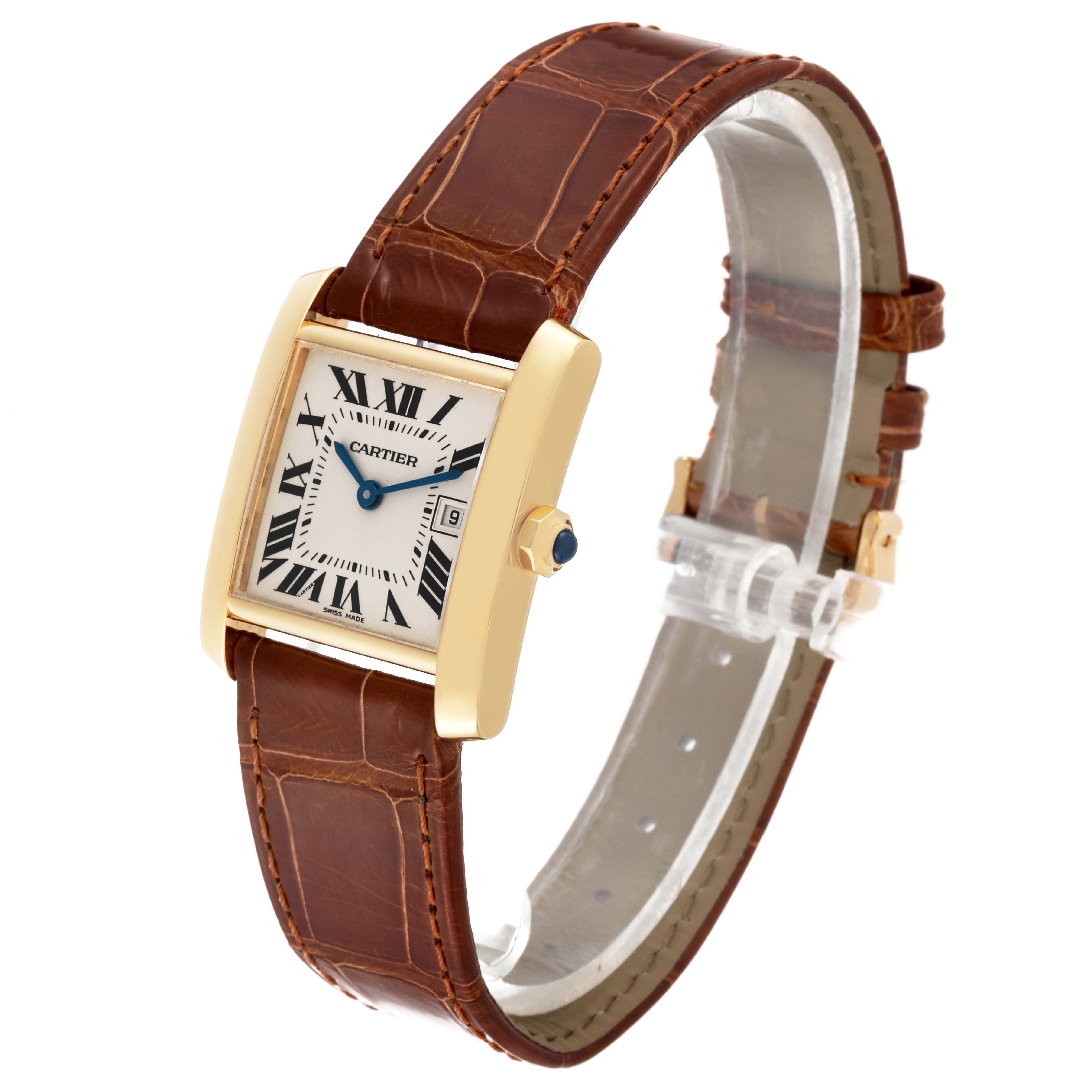 The Cartier Tank Francaise W5001456 Women's Yellow Gold Silver Dial W5001456 Women's Yellow Gold Silver Dial watch is shown at a three-quarter angle, highlighting its brown leather strap, gold case, and Roman numeral dial.