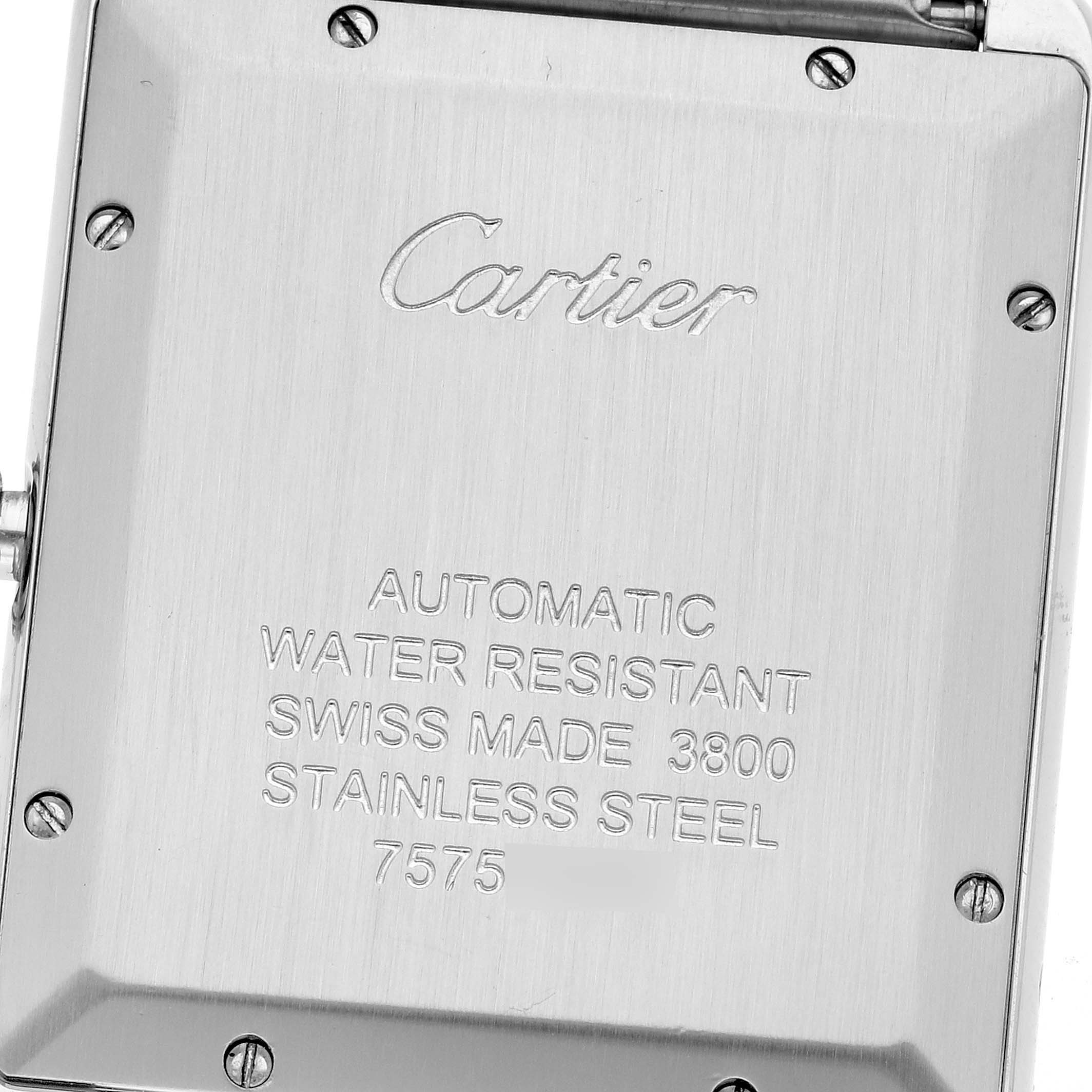 The image shows the back case of a Cartier Tank Solo W5200028 Men's Stainless Steel Silver Dial W5200028 Men's Stainless Steel Silver Dial watch, highlighting its stainless steel material and inscriptions.
