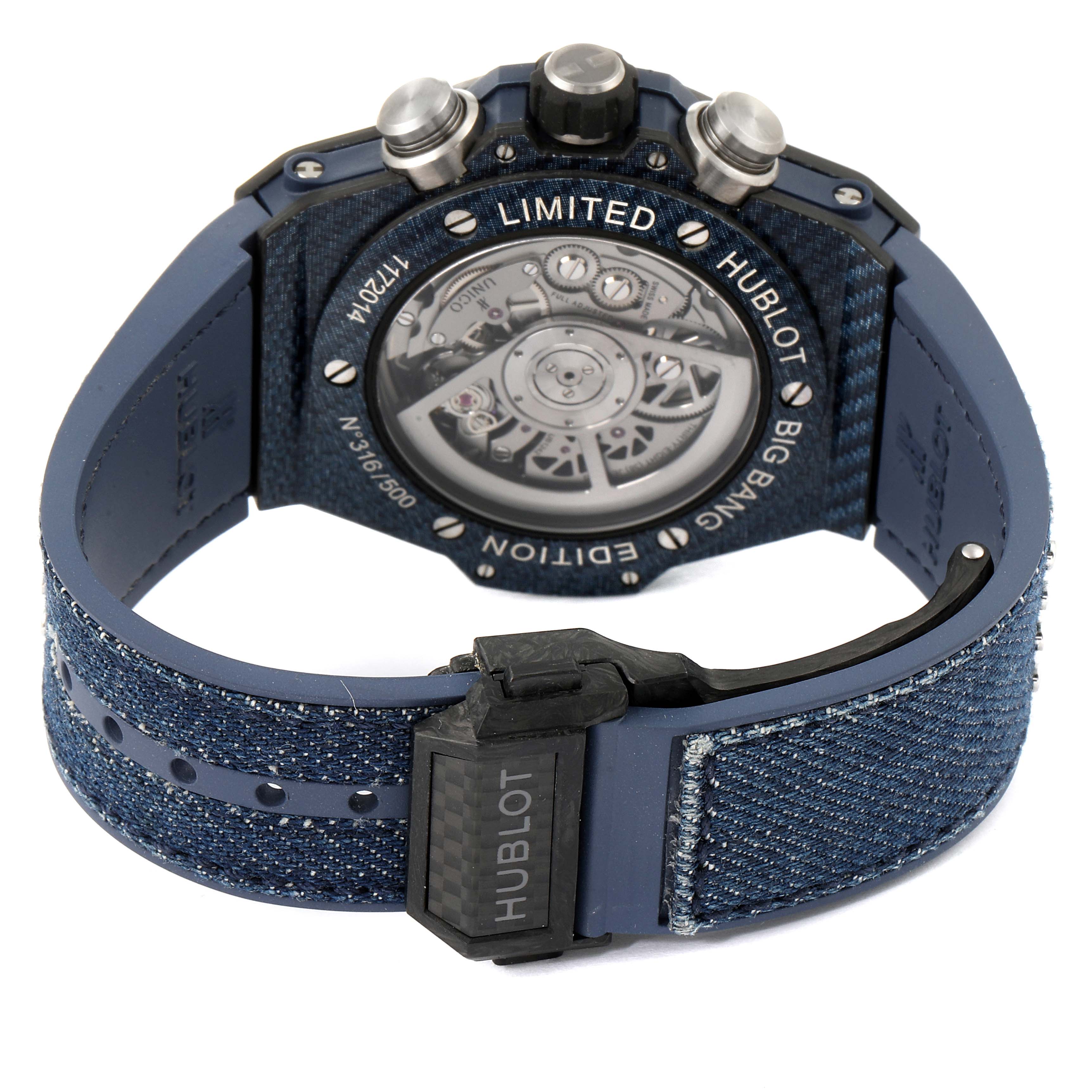 The image shows the back and strap of the Hublot Big Bang Unico 411.YL.5190.NR.ITI16 Men's Titanium Transparent Dial 411.YL.5190.NR.ITI16 Men's Titanium Transparent Dial watch, highlighting its open case back and denim strap.