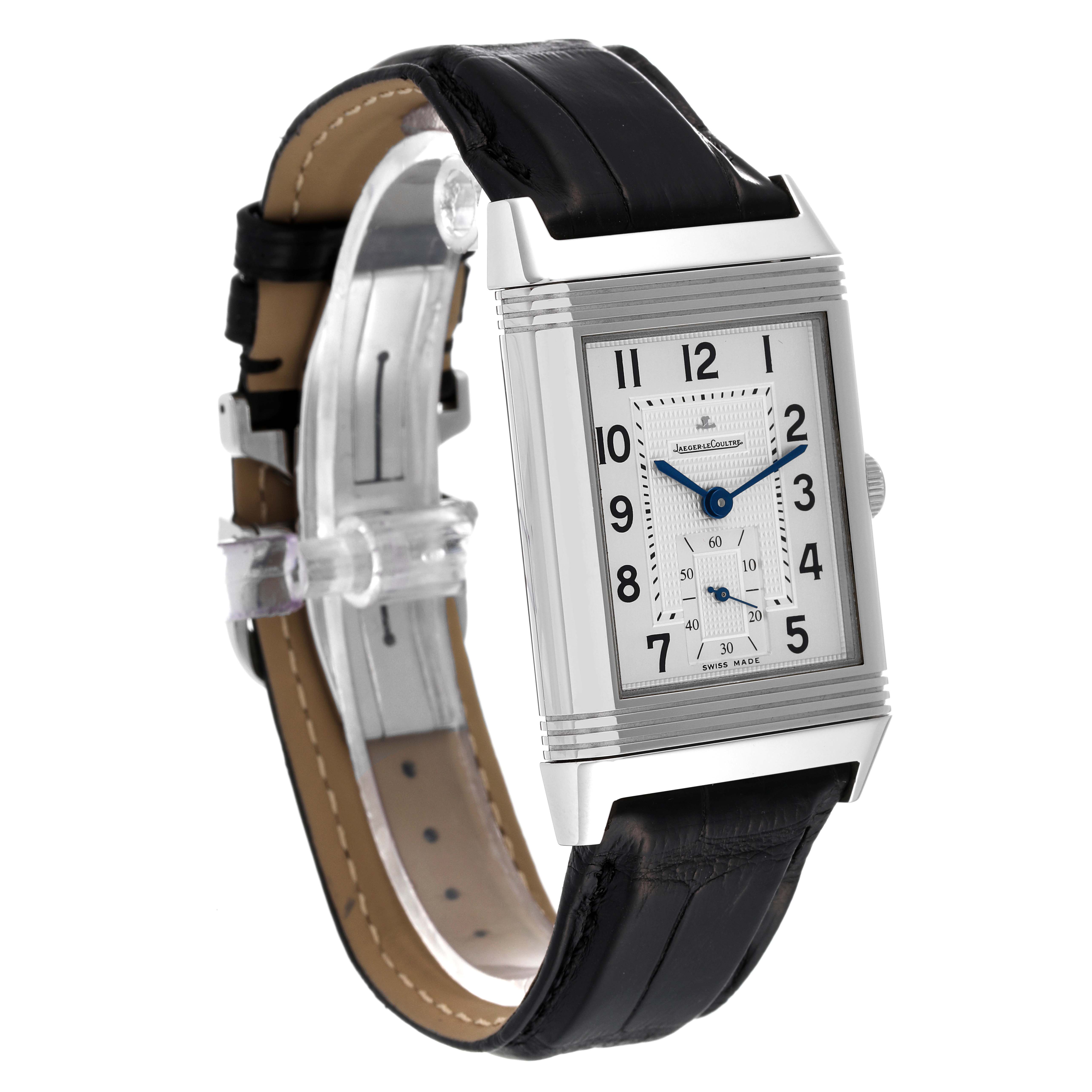 This Jaeger-LeCoultre Reverso watch is shown at an angle revealing the front dial, case, crown, and black leather strap.