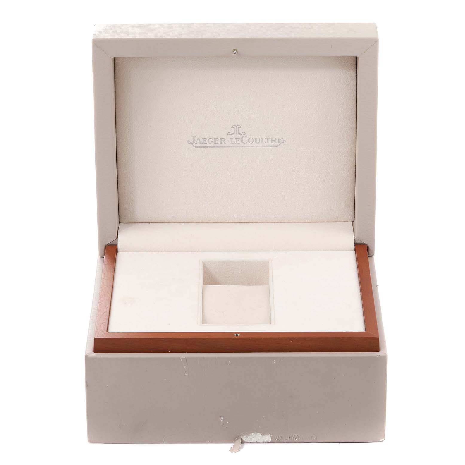 The image shows an open Jaeger LeCoultre Reverso Q3738420 Men
s Stainless Steel Silver Dial Q3738420 Men
s Stainless Steel Silver Dial watch box, highlighting its interior compartments and branding.