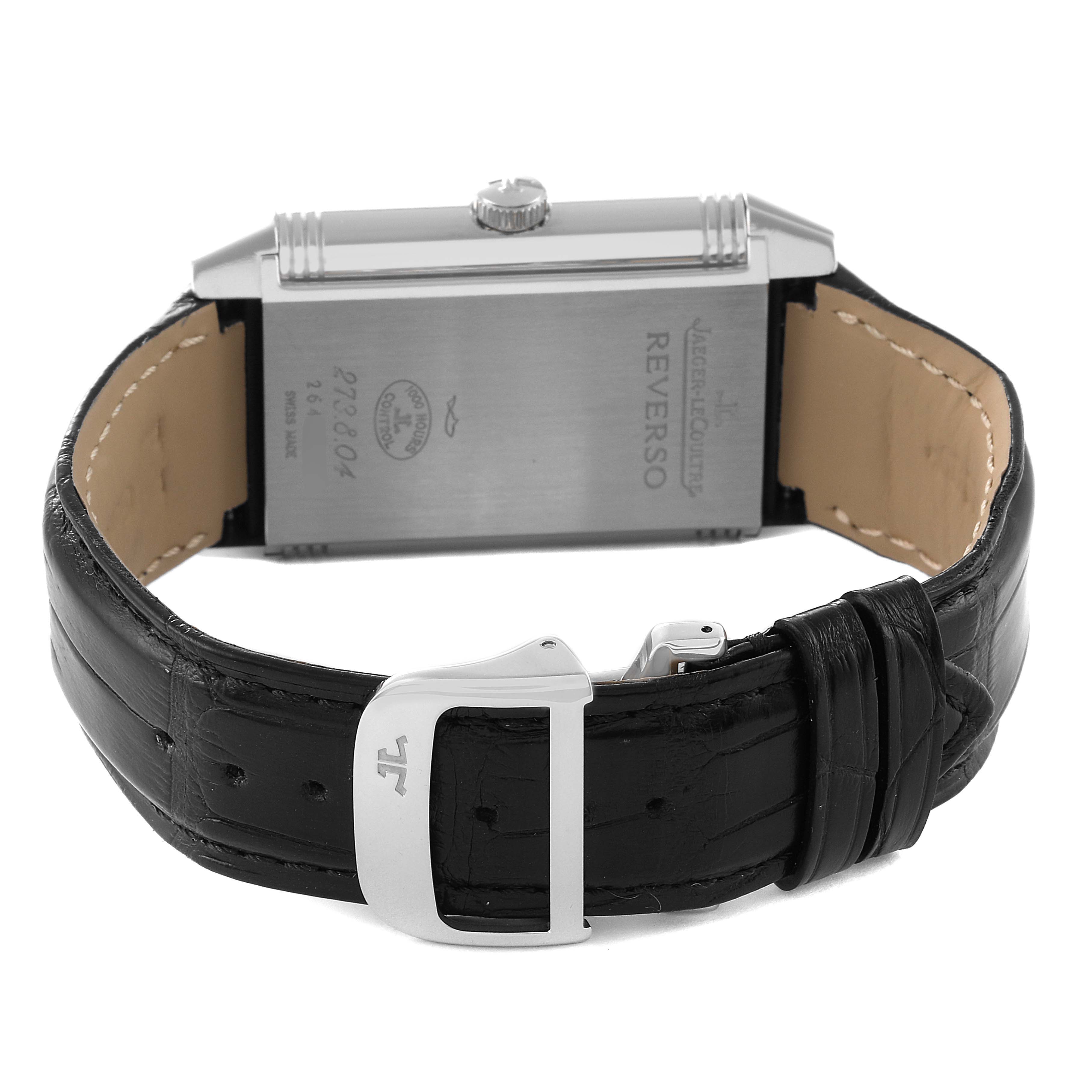 The image shows the back view of a Jaeger LeCoultre Reverso Q3738420 Men
s Stainless Steel Silver Dial Q3738420 Men
s Stainless Steel Silver Dial watch, including its stainless steel case and black leather strap with clasp.