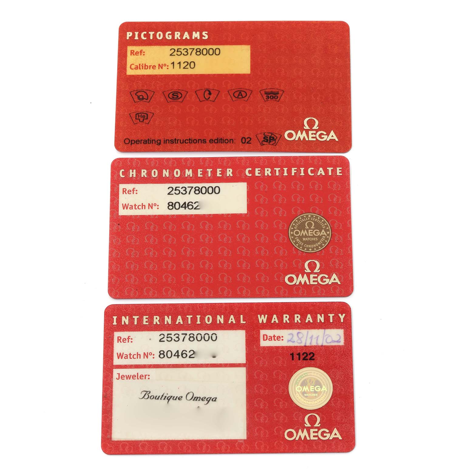 The image shows three red cards for the Omega Seamaster 2537.80.00 Men's Stainless Steel Blue Dial 2537.80.00 Men's Stainless Steel Blue Dial watch: Pictograms, Chronometer Certificate, and International Warranty.