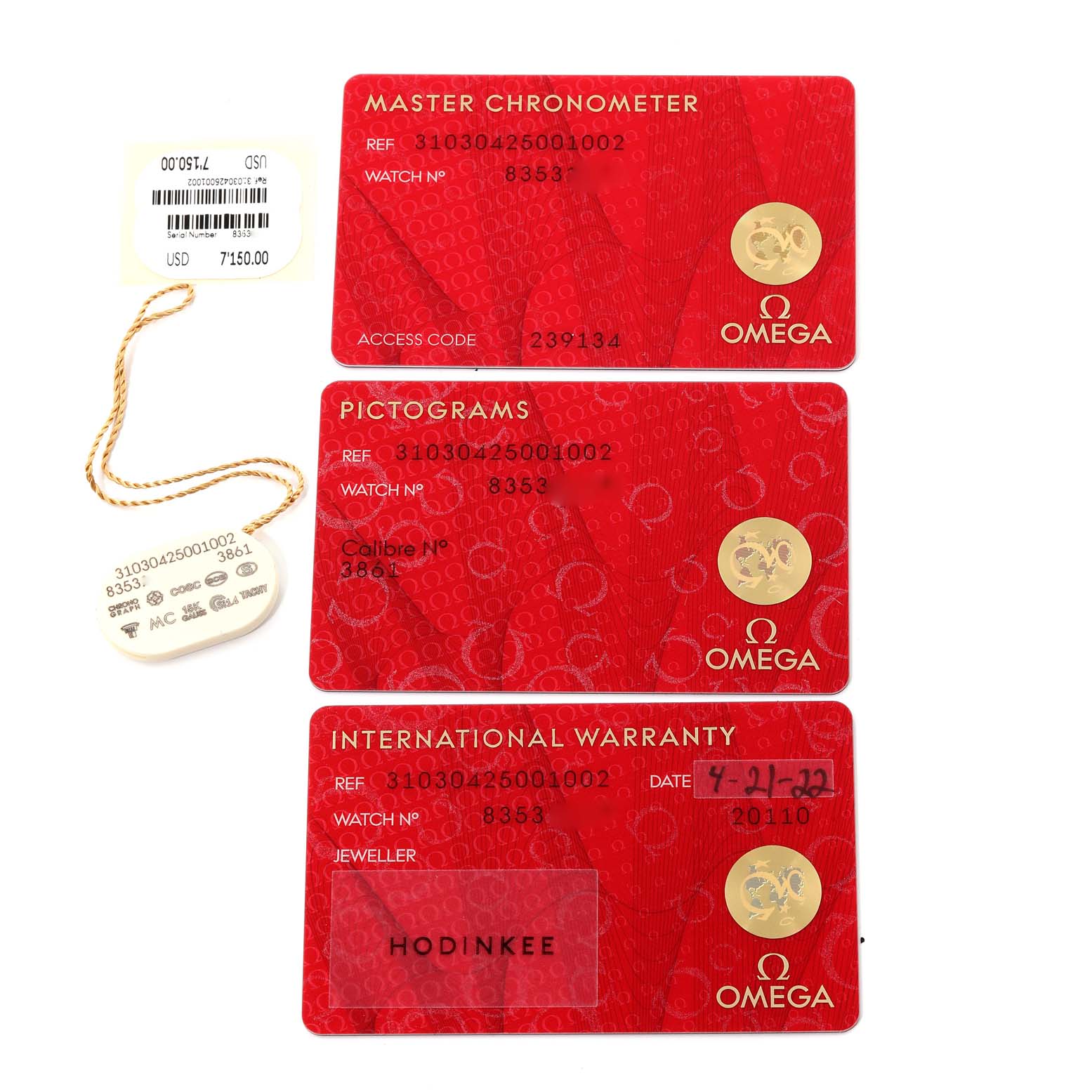 The image shows the certification and warranty cards for an Omega Speedmaster 310.30.42.50.01.002 Men
s Stainless Steel Black Dial 310.30.42.50.01.002 Men
s Stainless Steel Black Dial watch.