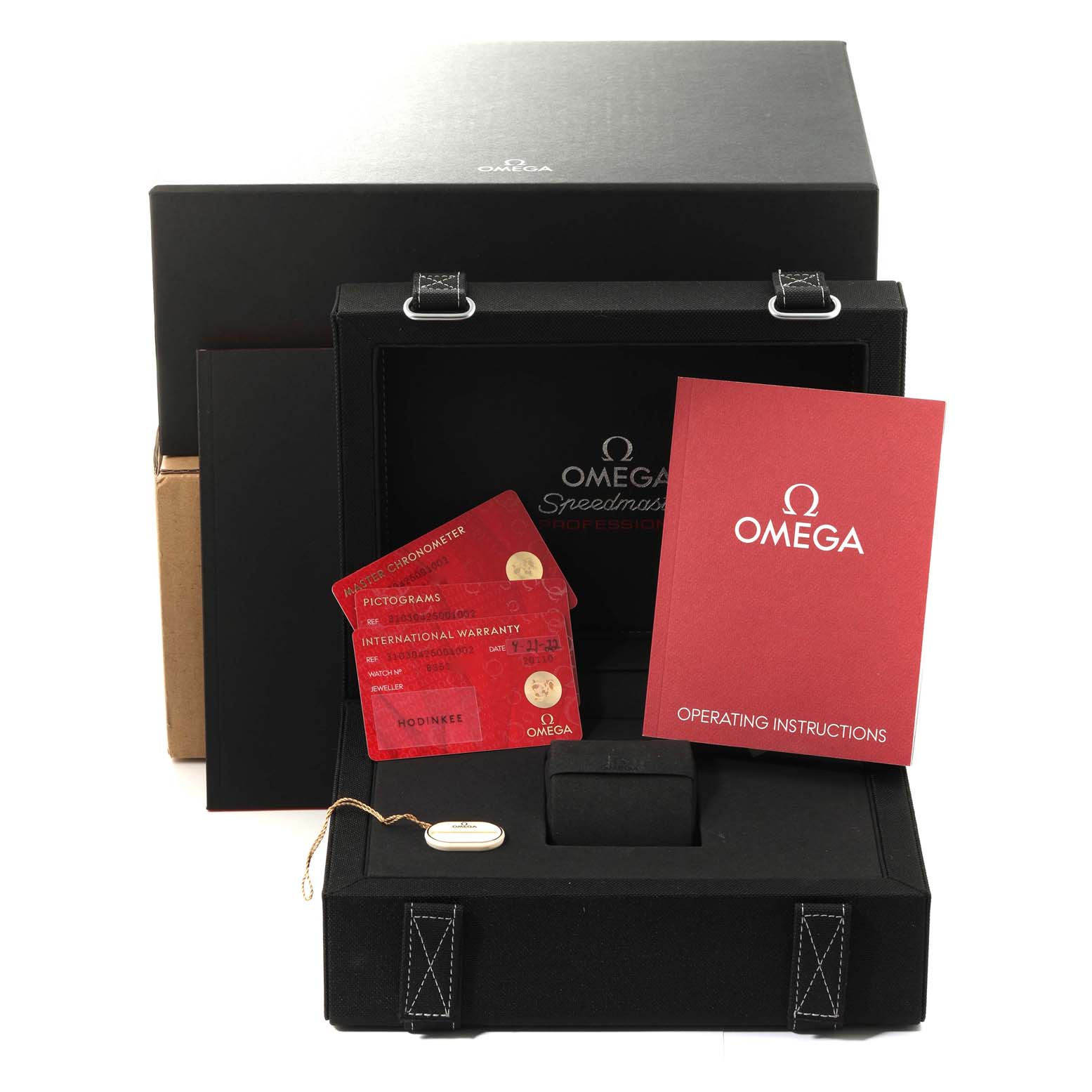 The Omega Speedmaster 310.30.42.50.01.002 Men
s Stainless Steel Black Dial 310.30.42.50.01.002 Men
s Stainless Steel Black Dial watch package includes the box, warranty cards, operating instructions, and a tag.