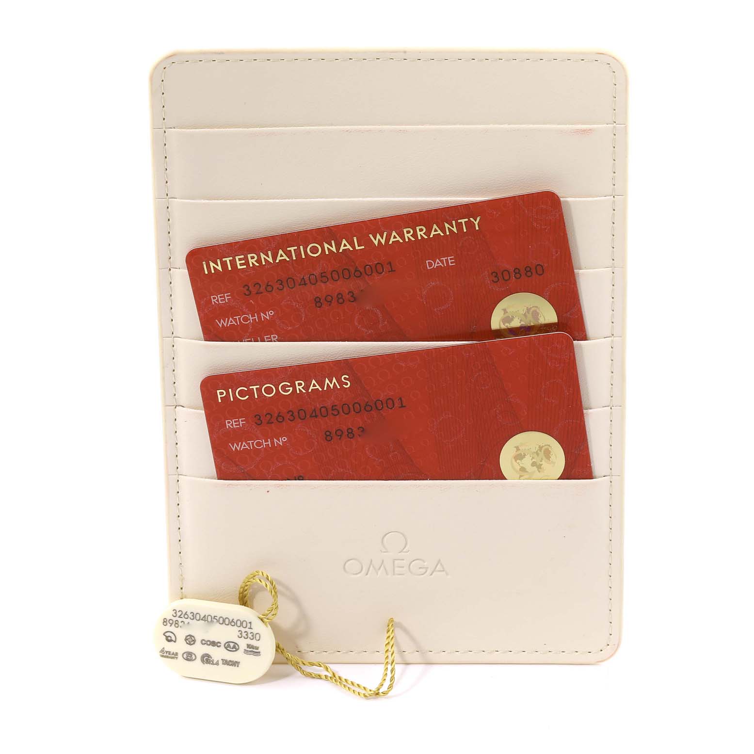 The image shows Omega Speedmaster 326.30.40.50.06.001 Men
s Stainless Steel Grey Dial 326.30.40.50.06.001 Men
s Stainless Steel Grey Dial
s international warranty and pictograms cards in a white cardholder.