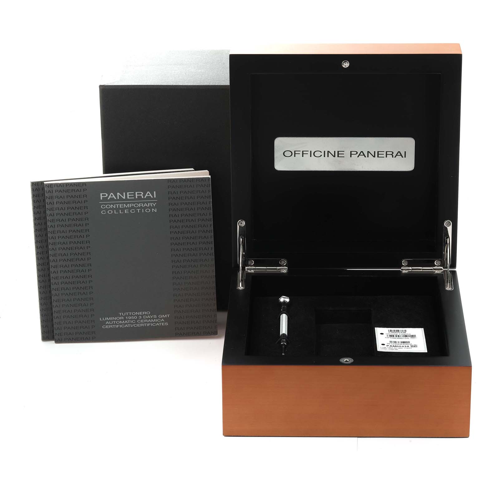 The image shows a Panerai Luminor PAM00438 Men's Ceramic Black Dial PAM00438 Men's Ceramic Black Dial watch box, an open wooden case, a booklet, and a tool for the watch.