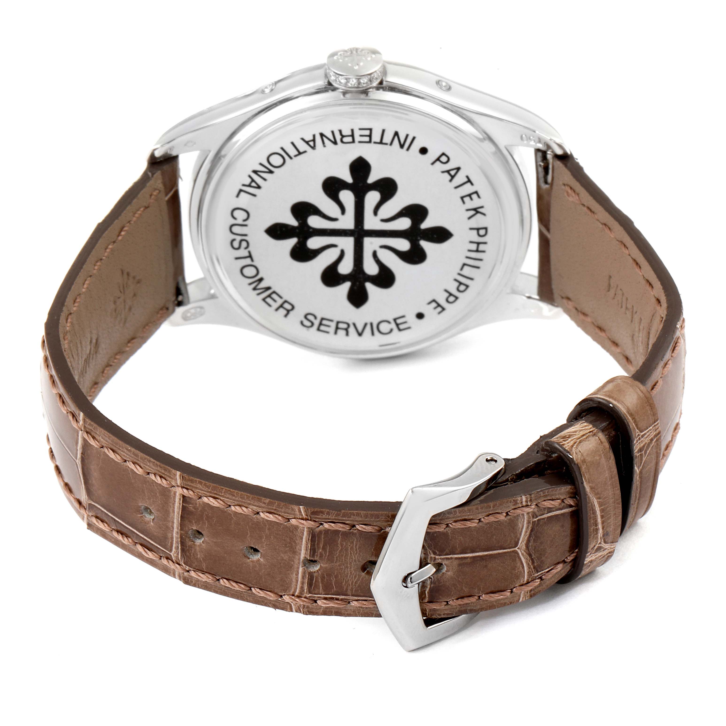 The image shows the back view of a Patek Philippe Complications 4936G - 001 Men's White Gold Mother of Pearl Dial 4936G - 001 Men's White Gold Mother of Pearl Dial watch, highlighting its case back and leather strap.