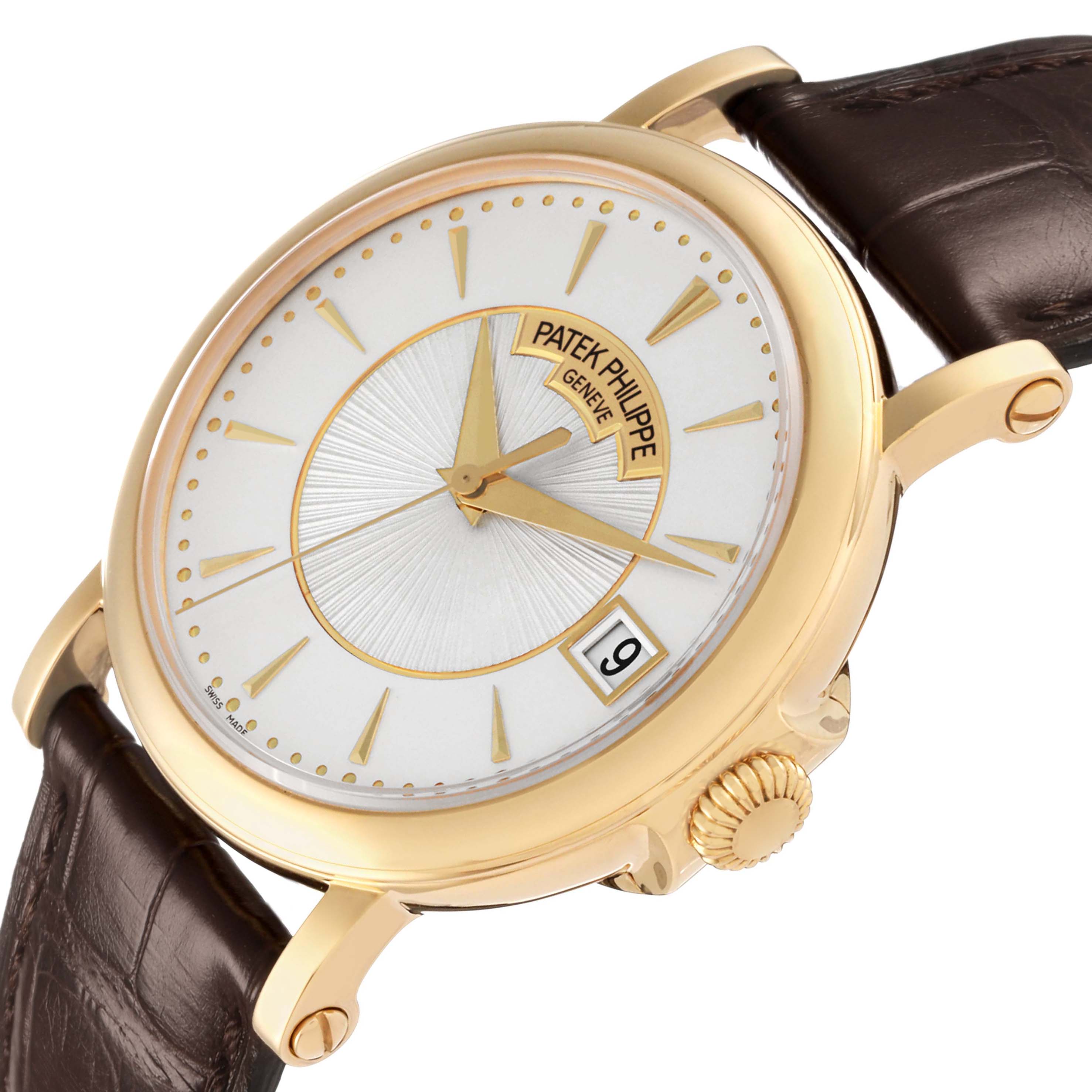 The Patek Philippe Calatrava 5153J-001 Men's Yellow Gold Silver Dial watch is shown at an angled view highlighting the dial, hands, crown, and parts of the strap.