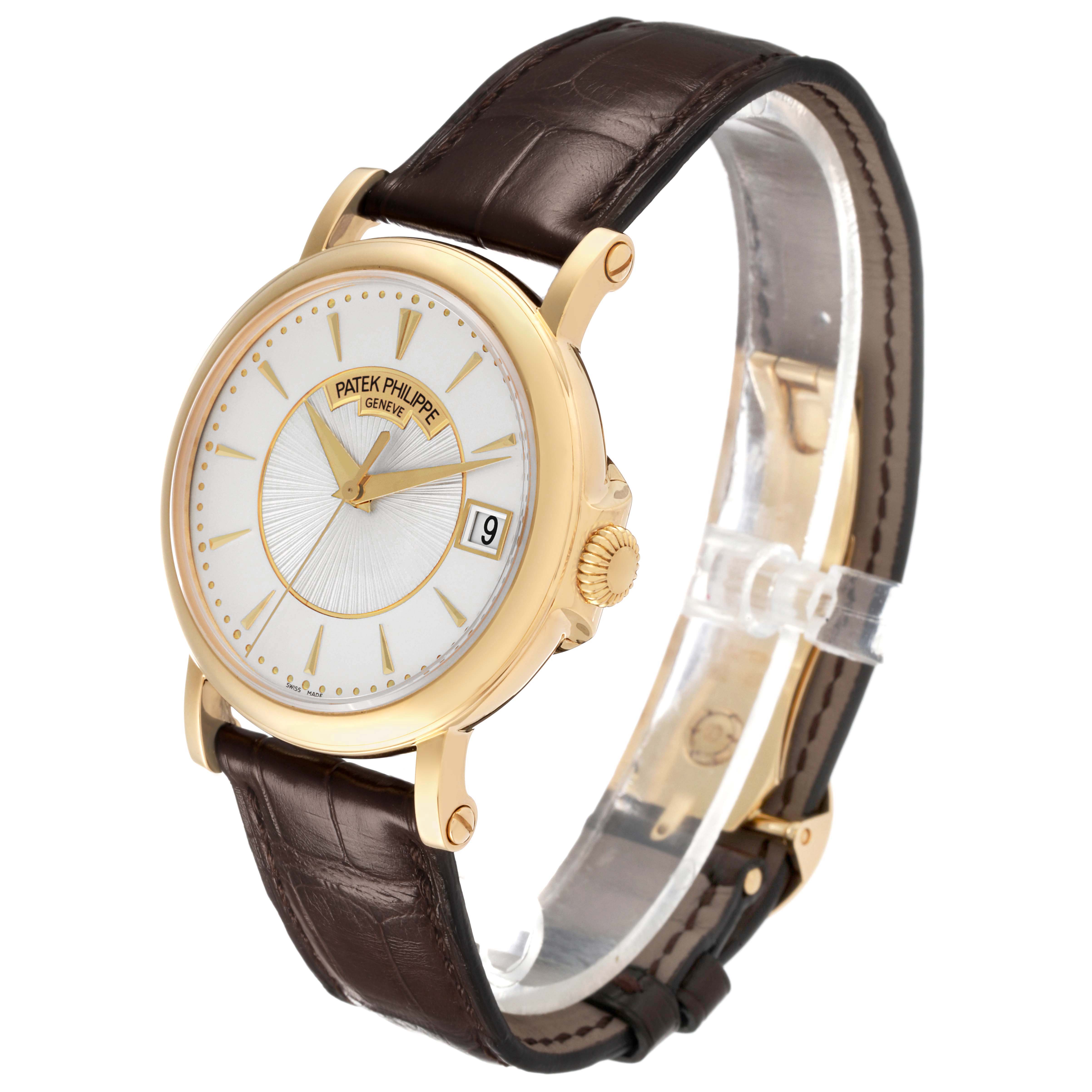 The watch is a Patek Philippe Calatrava 5153J-001 Men's Yellow Gold Silver Dial, shown at a slight side angle, highlighting the face, gold case, crown, and leather strap.