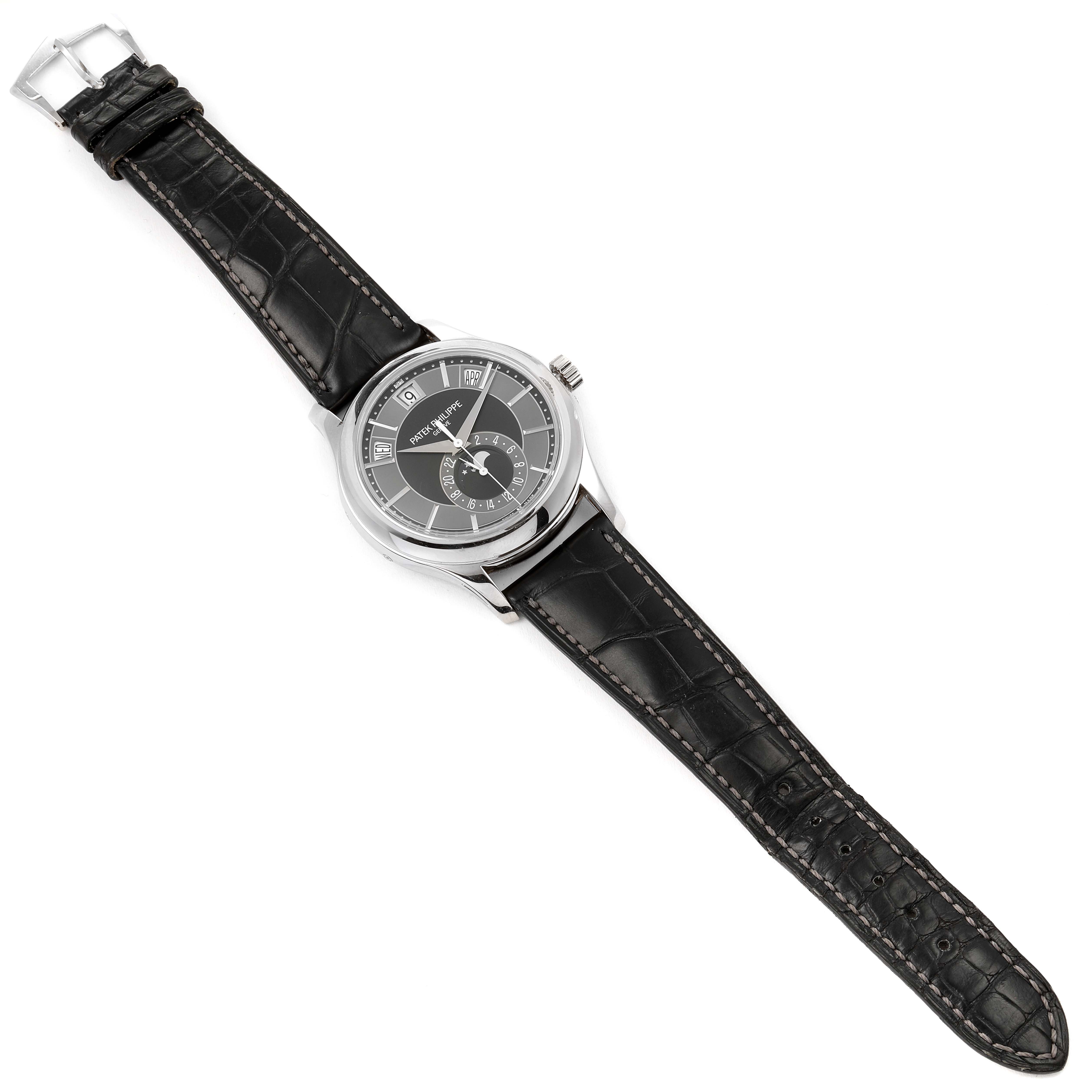 This is a top-down view of a Patek Philippe Complications 5205G - 010 Men's White Gold Grey Dial 5205G - 010 Men's White Gold Grey Dial model watch, showing the face, bezel, crown, and leather strap.