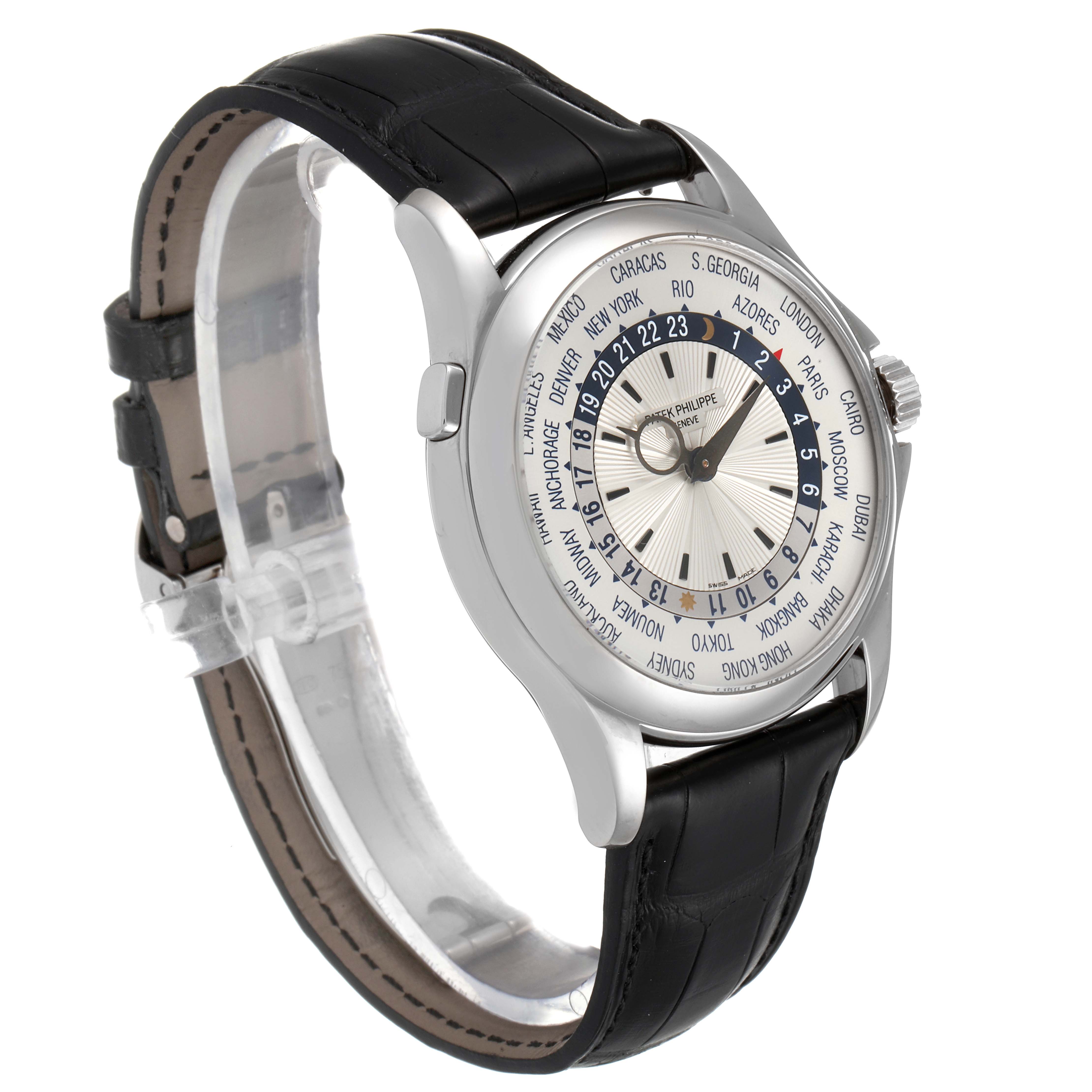 The image shows a side angle of a Patek Philippe Complications 5130G-019 Men's White Gold Silver Dial 5130G-019 Men's White Gold Silver Dial watch, highlighting its face, case, strap, and crown.