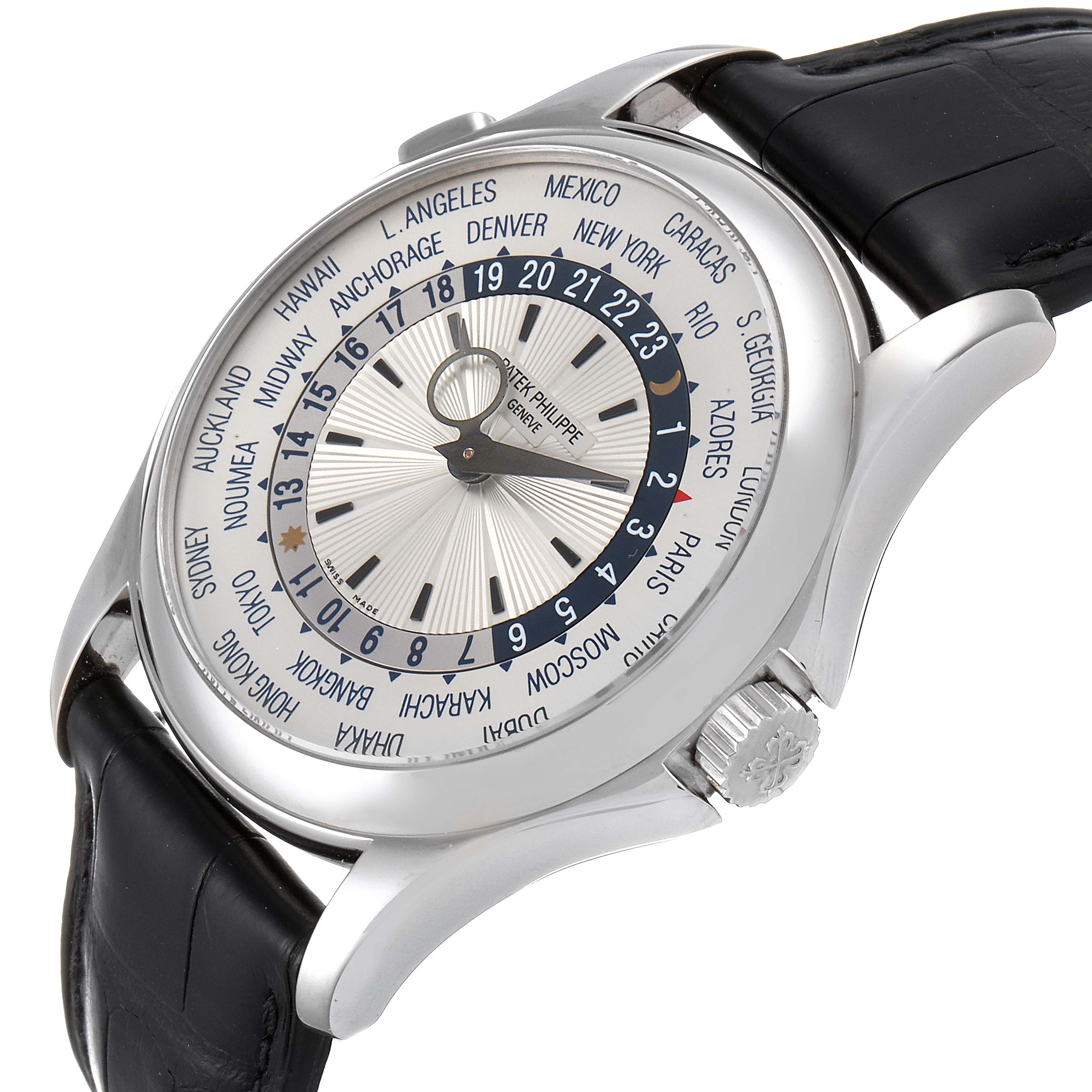 The Patek Philippe Complications 5130G-019 Men's White Gold Silver Dial 5130G-019 Men's White Gold Silver Dial model watch is shown at an angled side view, highlighting its dial, crown, and black leather strap.