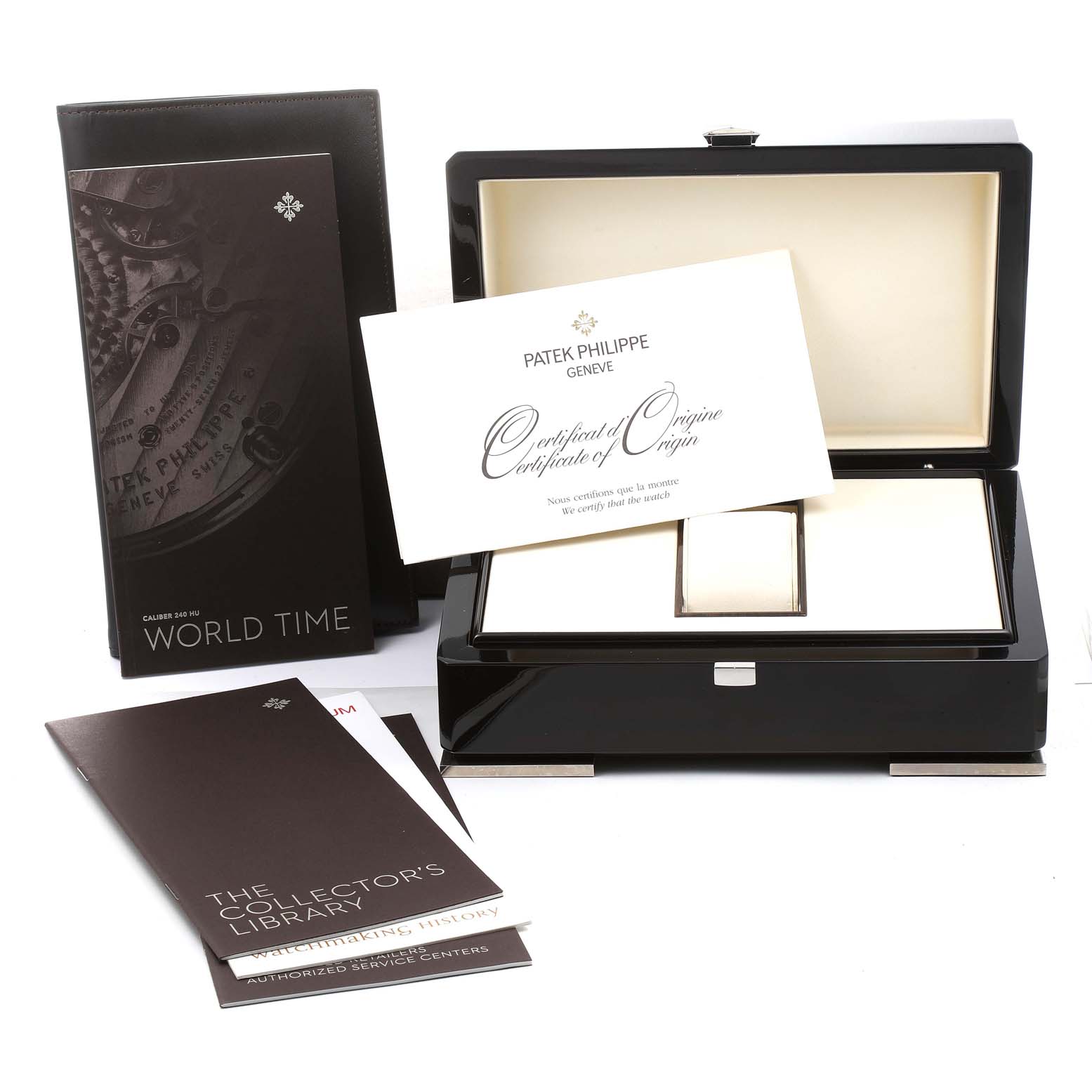 This image shows the packaging, certificate of origin, and manuals for a Patek Philippe Complications 5130G-019 Men's White Gold Silver Dial 5130G-019 Men's White Gold Silver Dial model watch.