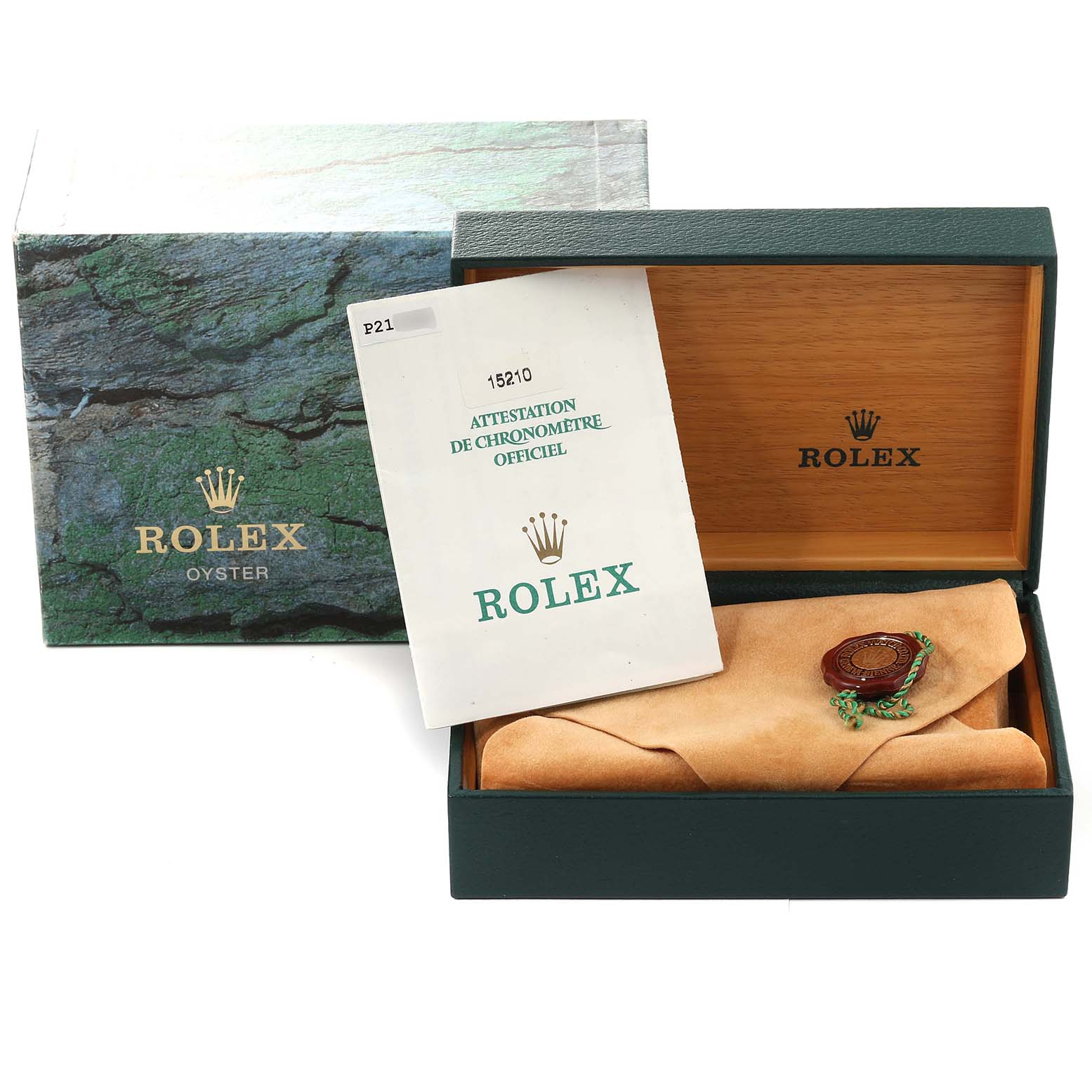 The image shows the box, manual, and certification for a Rolex Date 15210 Men's Stainless Steel Blue Dial 15210 Men's Stainless Steel Blue Dial model watch, along with its protective wrapping.