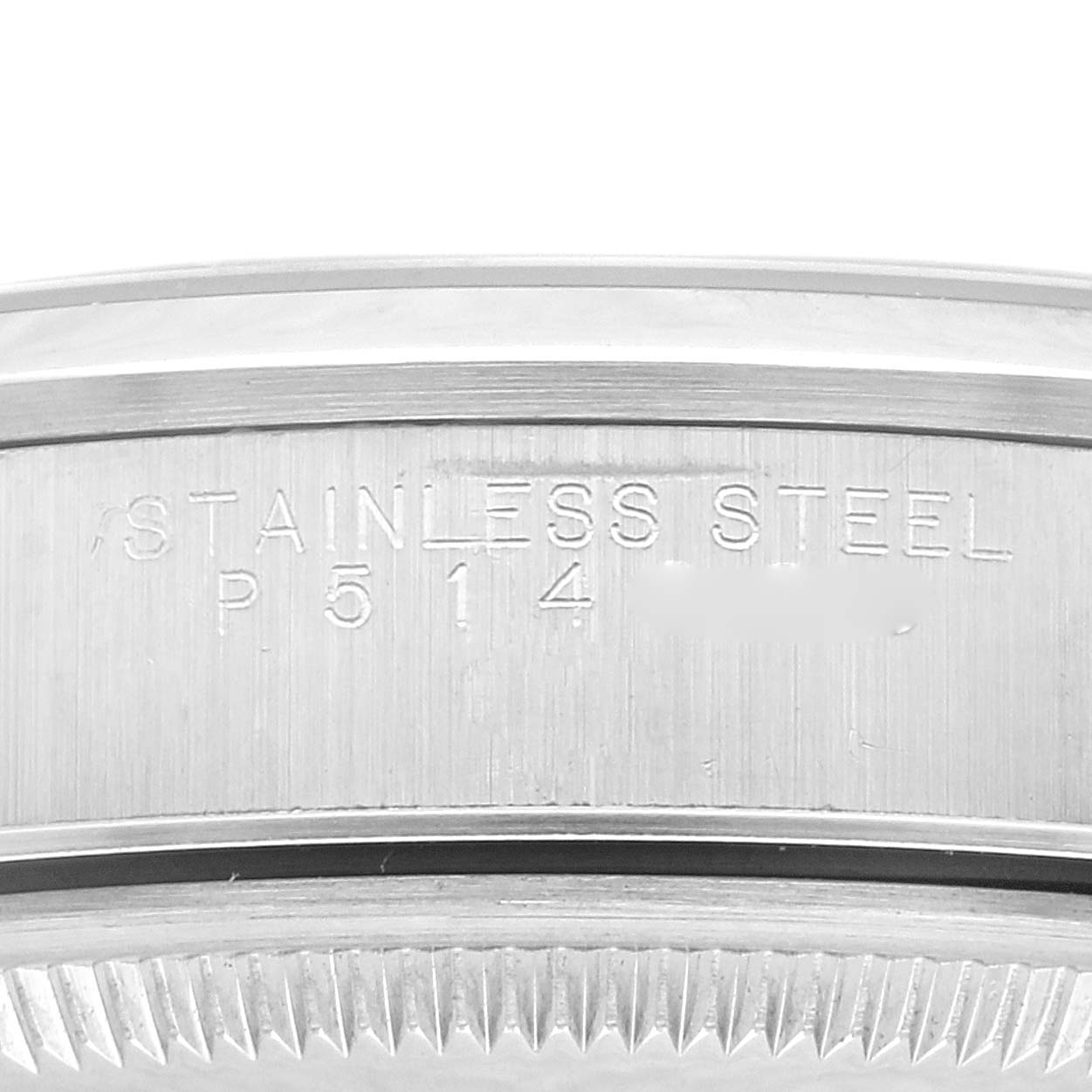 This close-up image shows the inscription "STAINLESS STEEL P514" on the case back of a Rolex Date 15200 Men's Stainless Steel Silver Dial 15200 Men's Stainless Steel Silver Dial model watch.