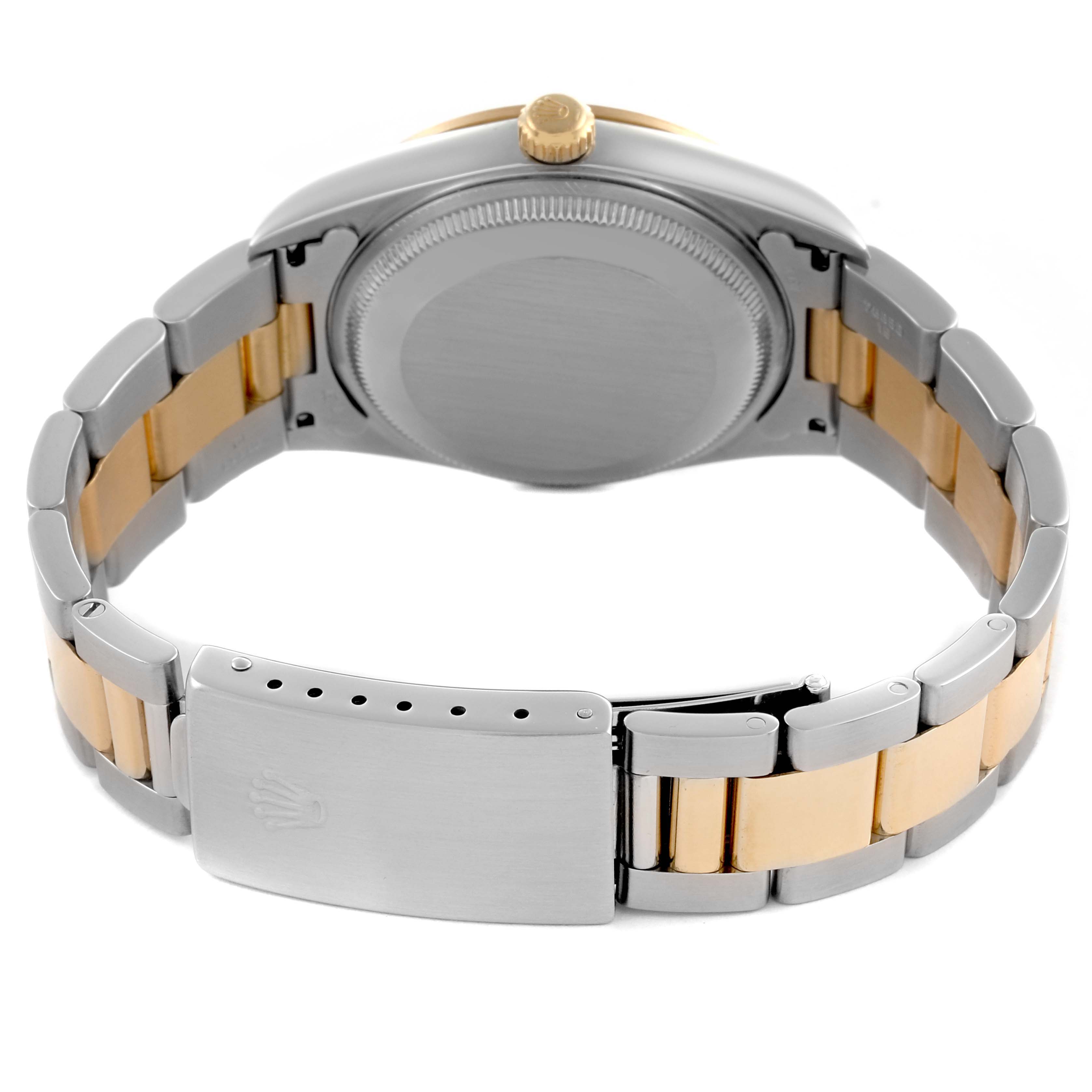 The Rolex Date 15203 Men's Steel and Gold (two tone) Champagne Dial 15203 Men's Steel and Gold (two tone) Champagne Dial watch is shown from the back, displaying the case back, crown, and two-tone bracelet with the clasp.