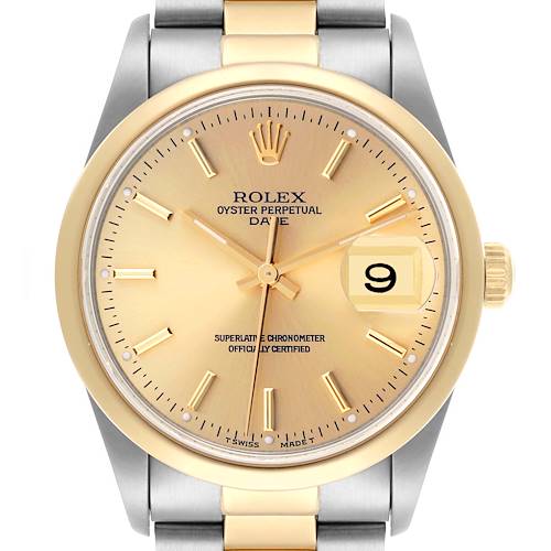 The image shows a front view of a Rolex Date watch, highlighting the gold bezel, dial, hands, and date window at 3 o'clock.