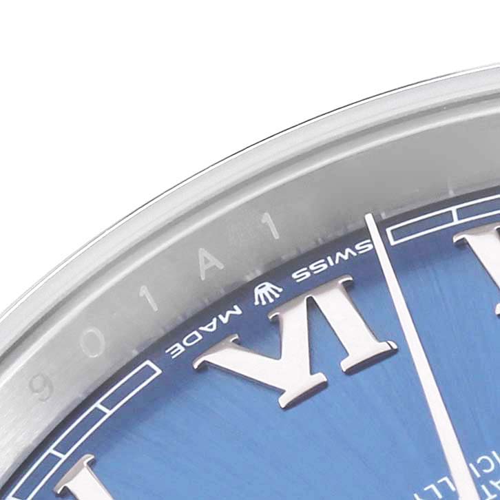 The image shows a close-up of the face and bezel details of a Rolex Datejust 41 126300 Men's Stainless Steel Blue Dial 126300 Men's Stainless Steel Blue Dial, highlighting the Roman numeral hour markers and "Swiss Made" text.