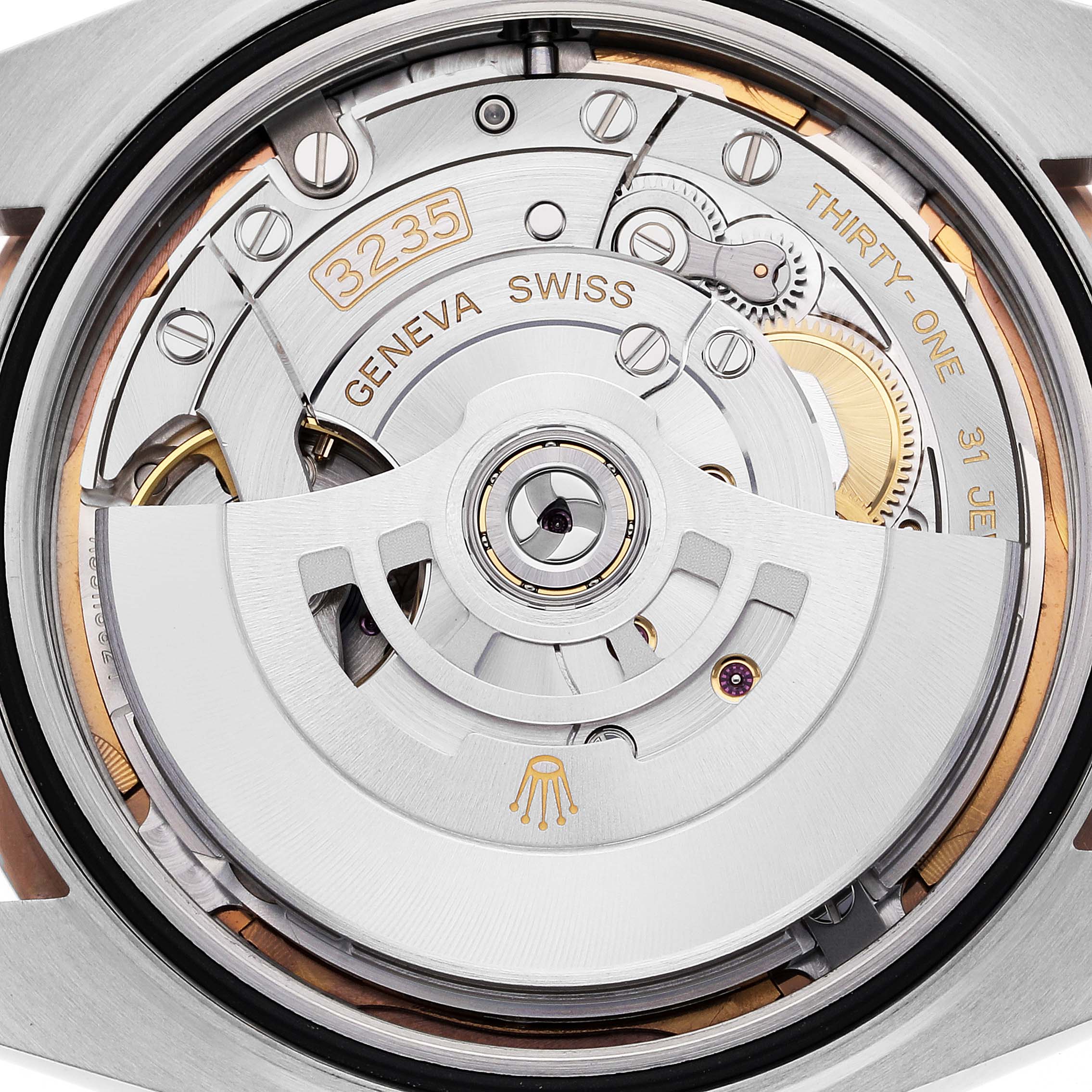 This is a close-up view of the movement of a Rolex Datejust 41 126331 Men's Steel and Gold (two tone) Brown Dial 126331 Men's Steel and Gold (two tone) Brown Dial watch, showcasing the intricate internal mechanics.