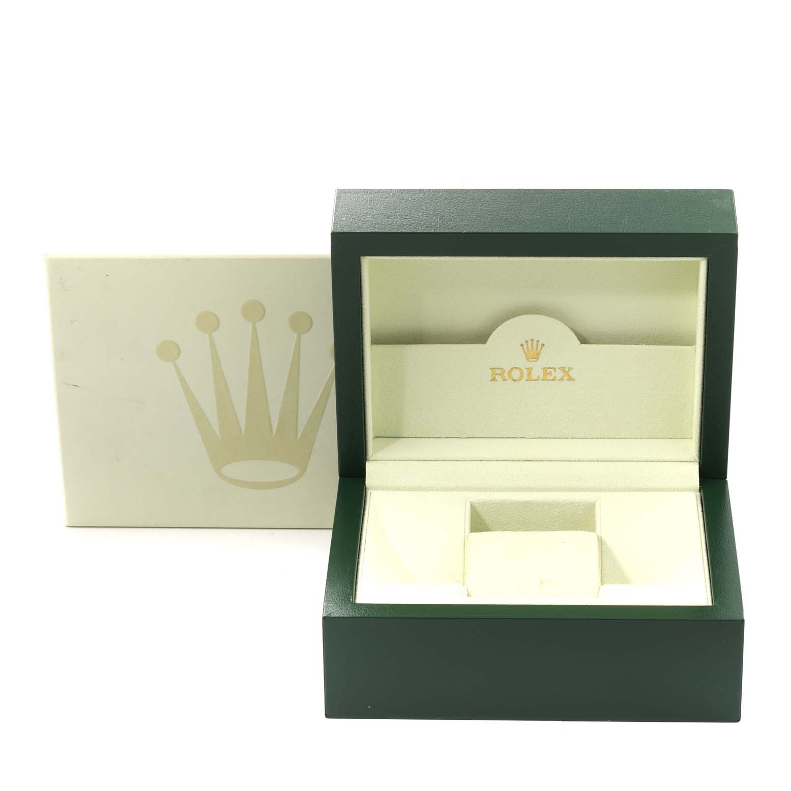 The image shows an open Rolex Mid-Size 178274 Women
s Stainless Steel Silver Dial 178274 Women
s Stainless Steel Silver Dial watch box from a front angle, displaying the brand logo and cushion holder inside.